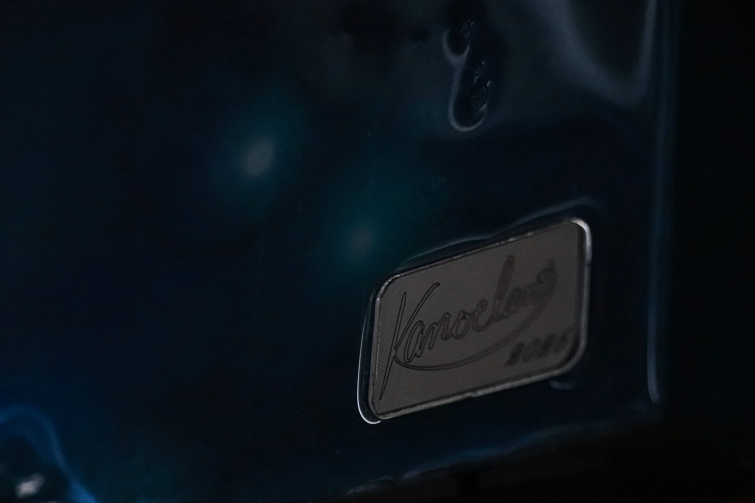 close up of artists name plate, Kanoelani 2026