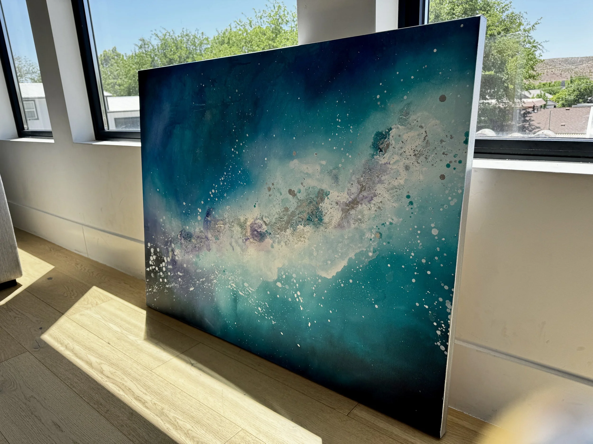 A large blue abstract painting, wall art, inspired by the cosmos and galaxy, luxury abstract art