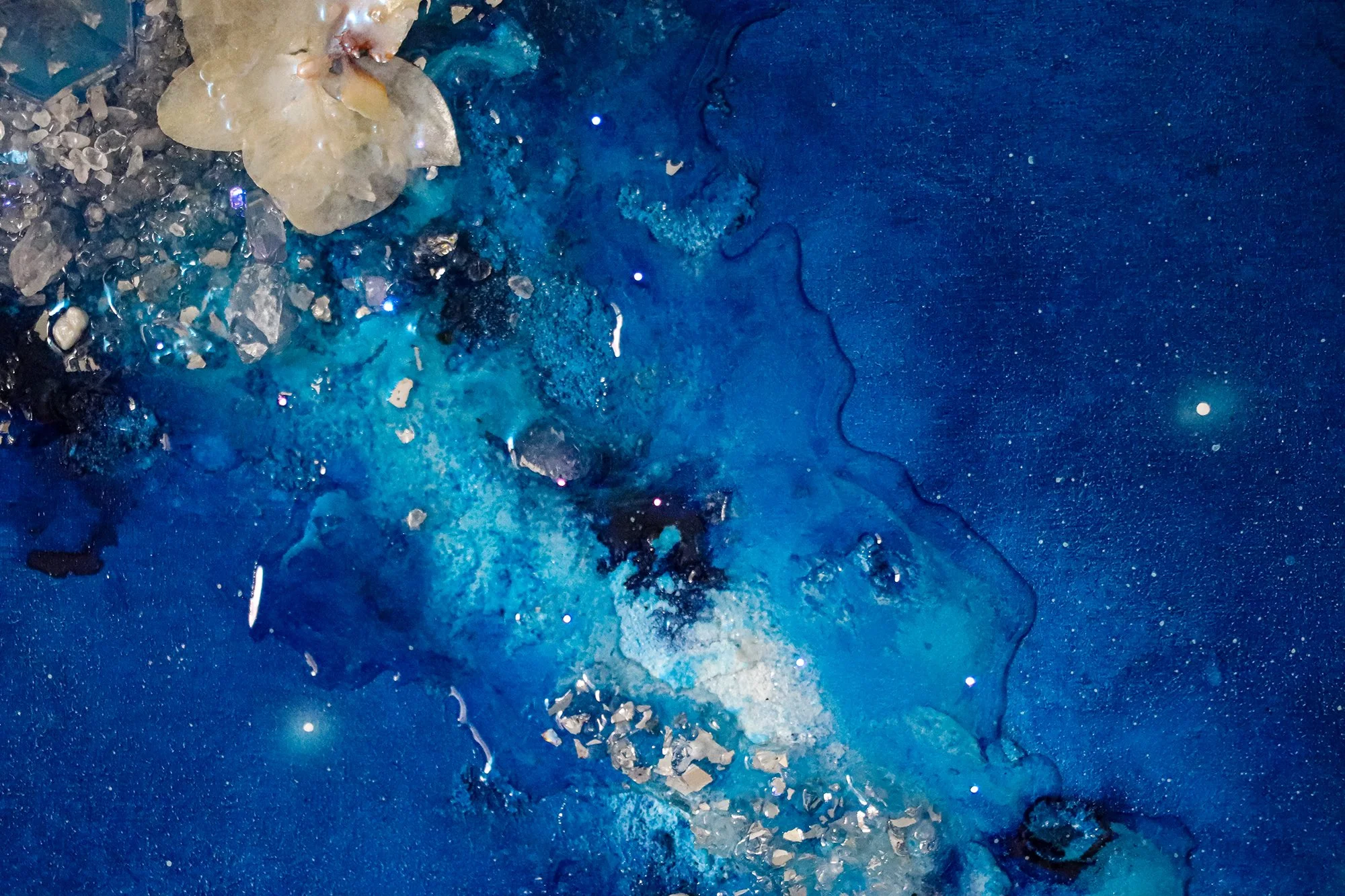 close up detail photo of blue textured wall art