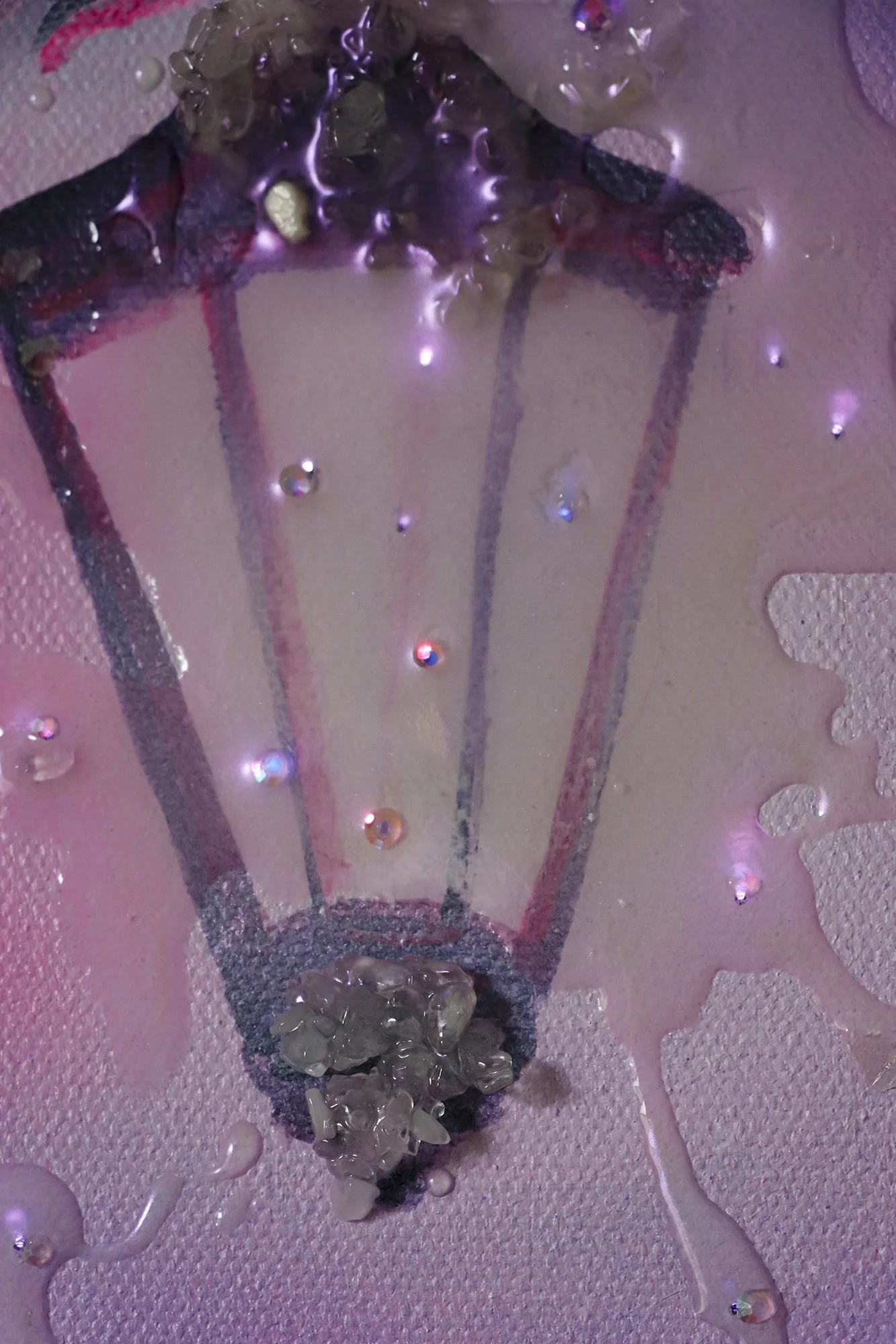 close up detail photo of light post painting with pink and purple fiber optic lights glowing, and Swarovski crystal rhinestones