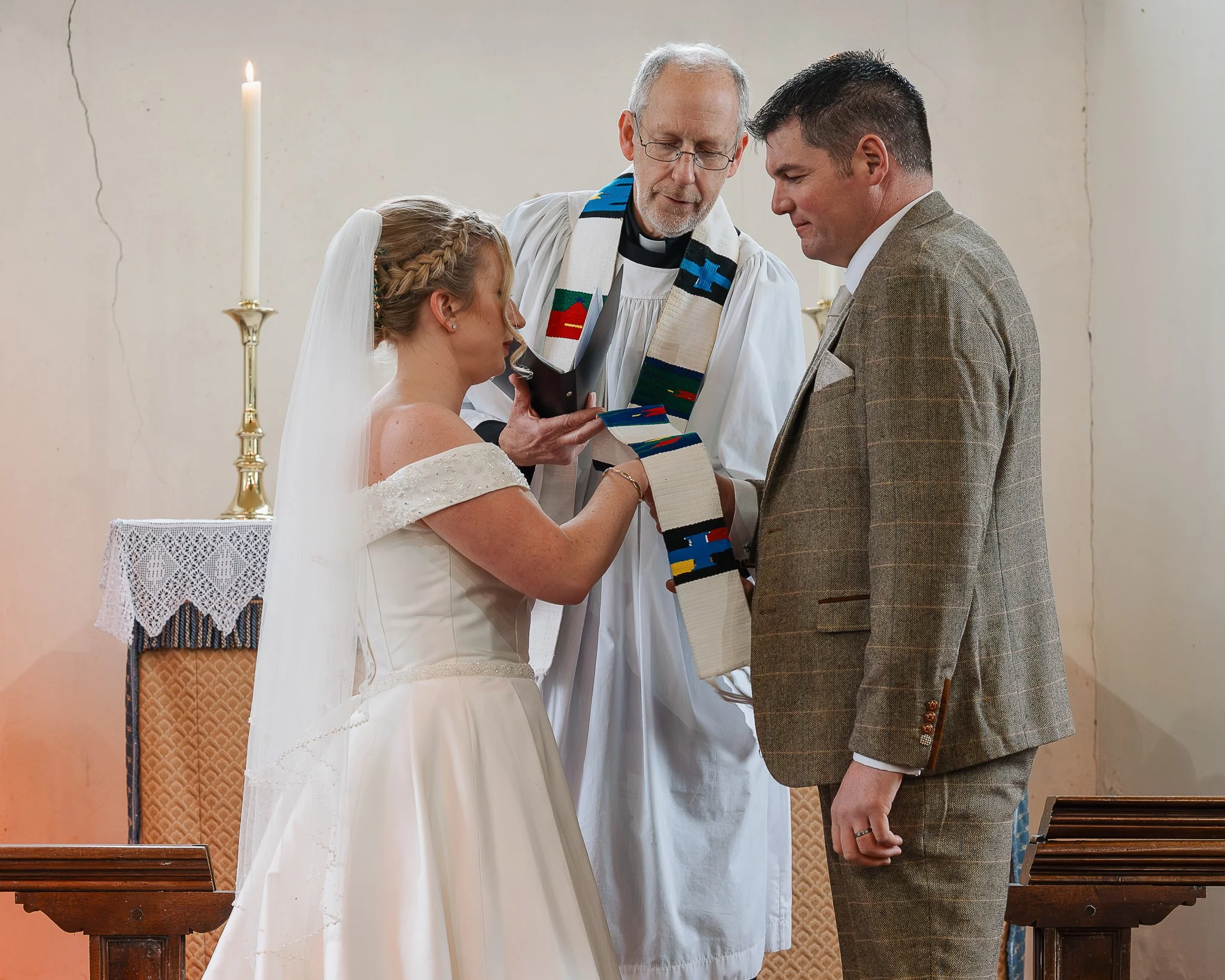 Bride walking down the aisle at St Andrew’s Church Norfolk wedding ceremony