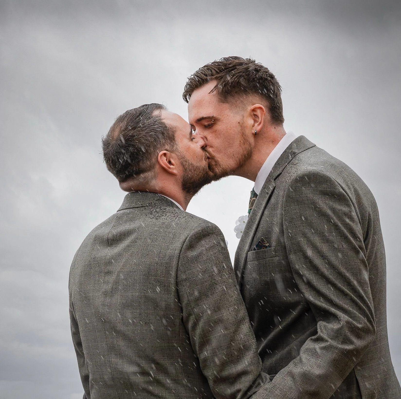 a gay couple kiss in norwich