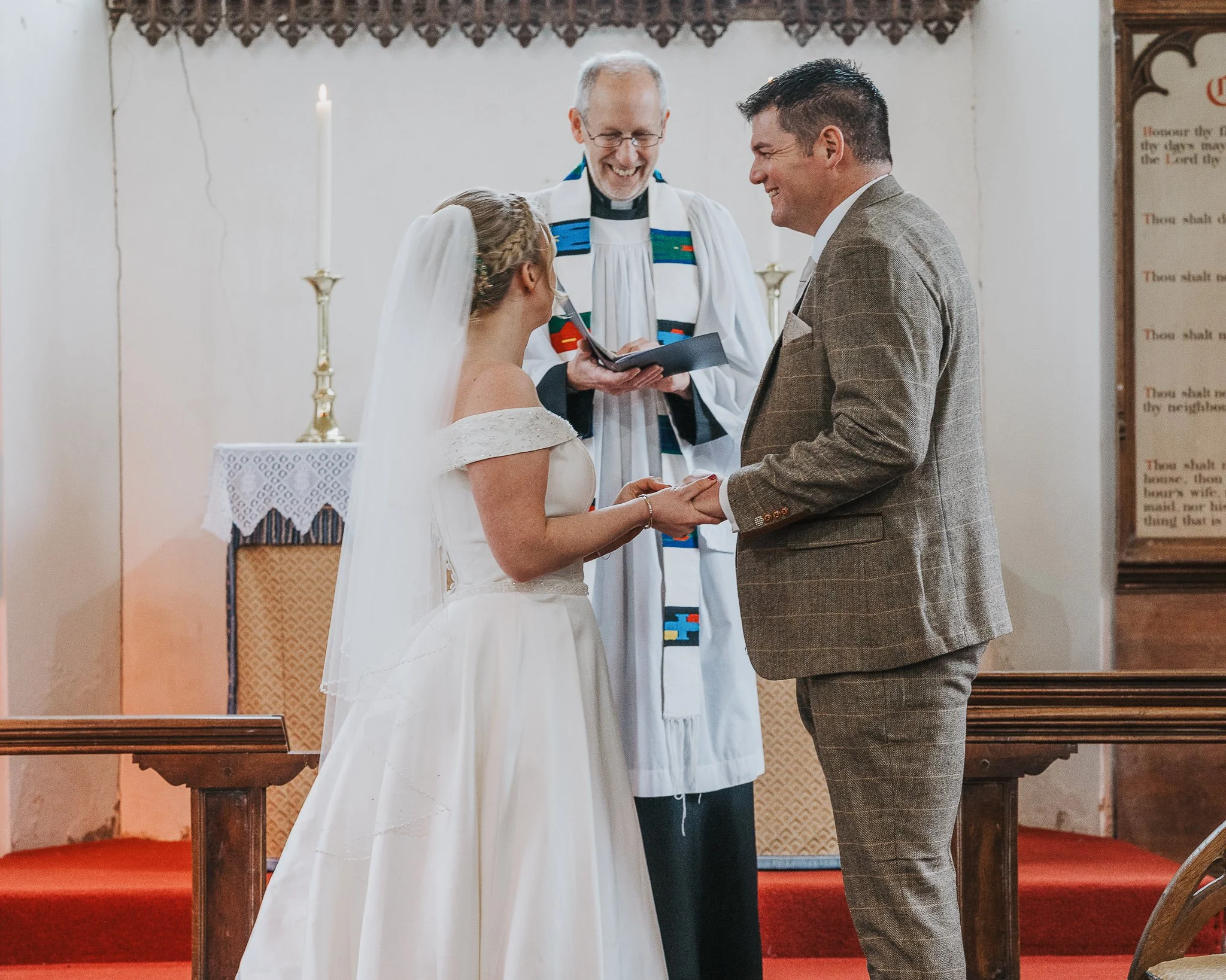 Groom emotional reaction during St Andrew’s Church Norfolk wedding ceremony