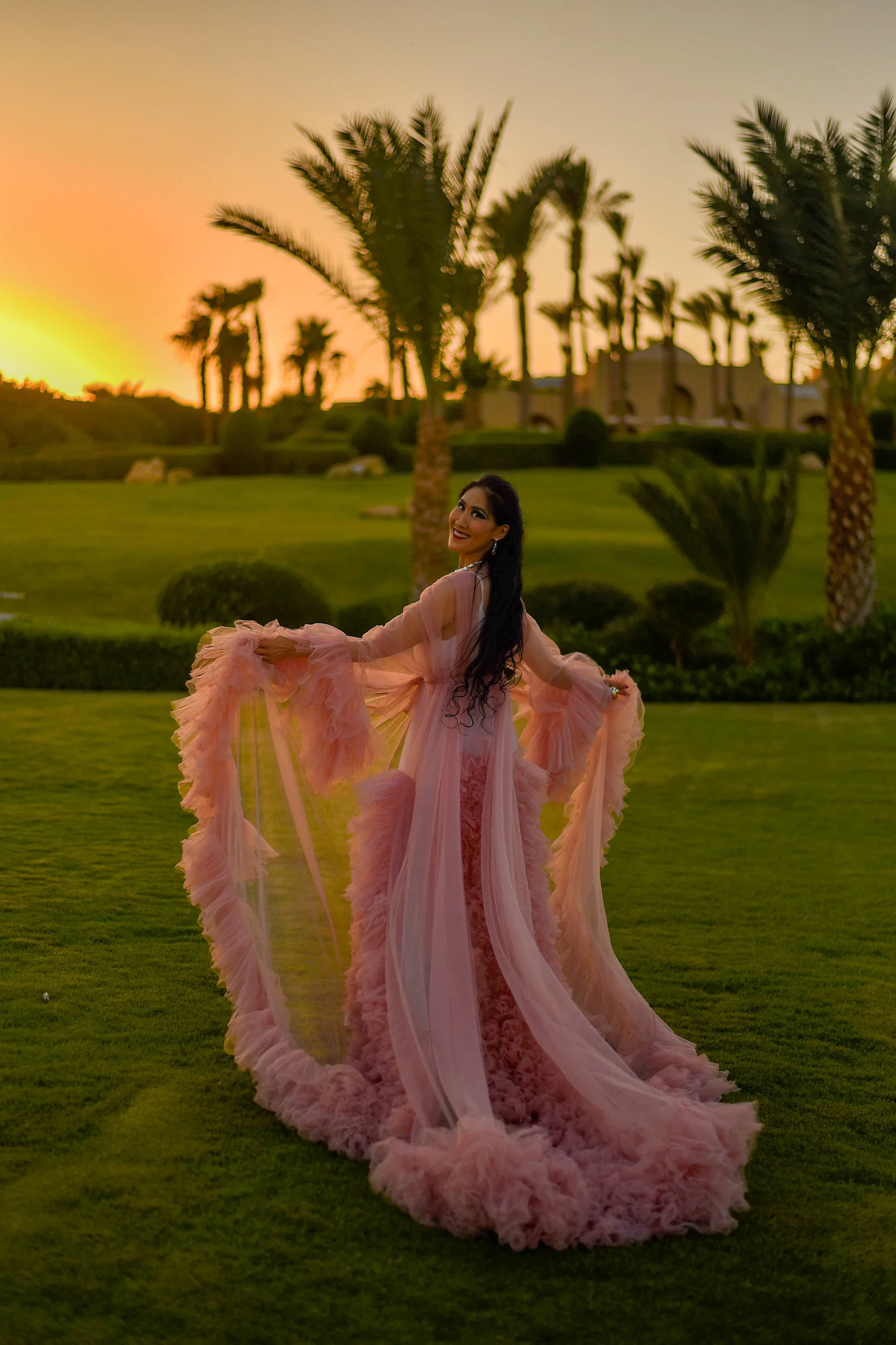 Pink.ArmsOutLookBehindSunset.JPG