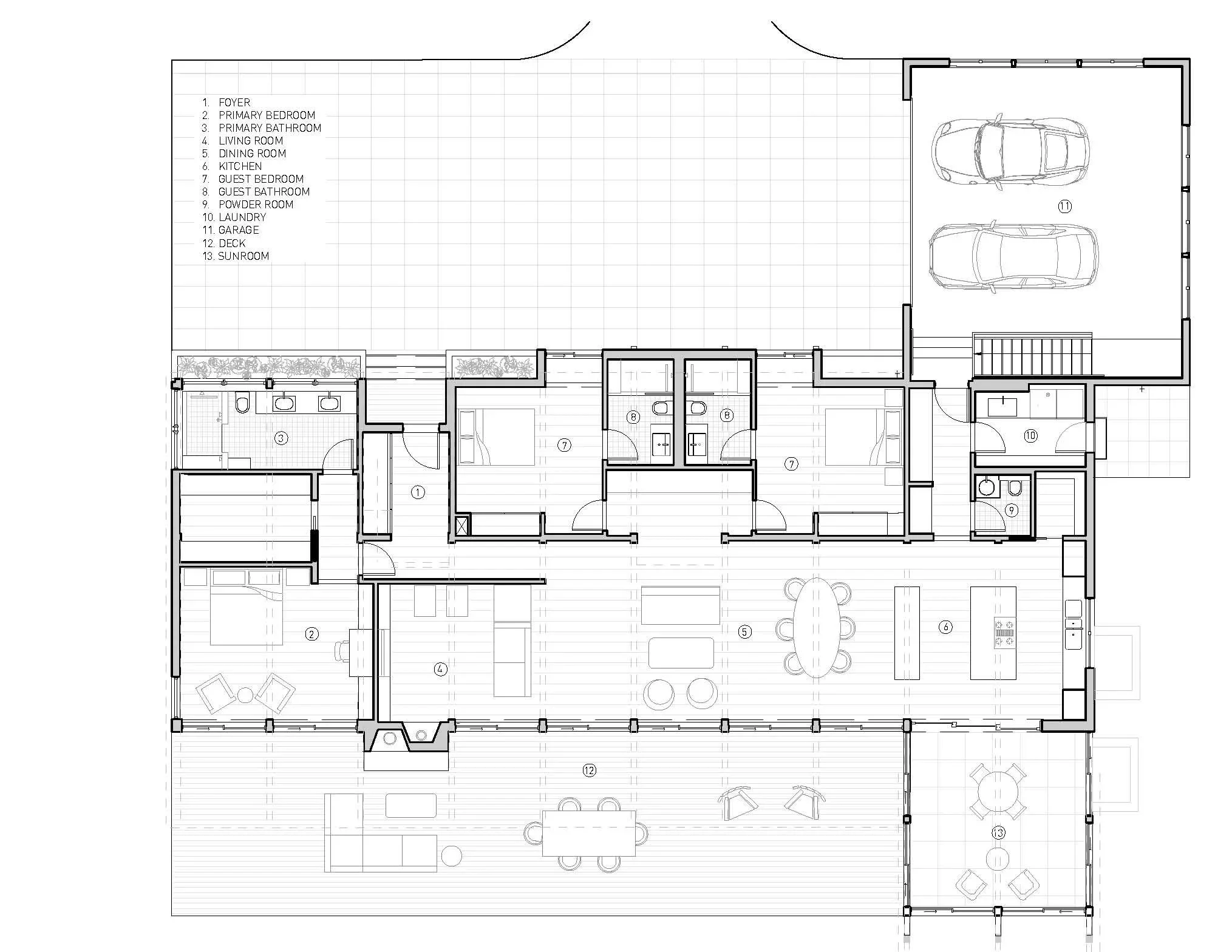 A detailed architectural floor plan of a house, showing rooms, doors, windows, and garage spaces.