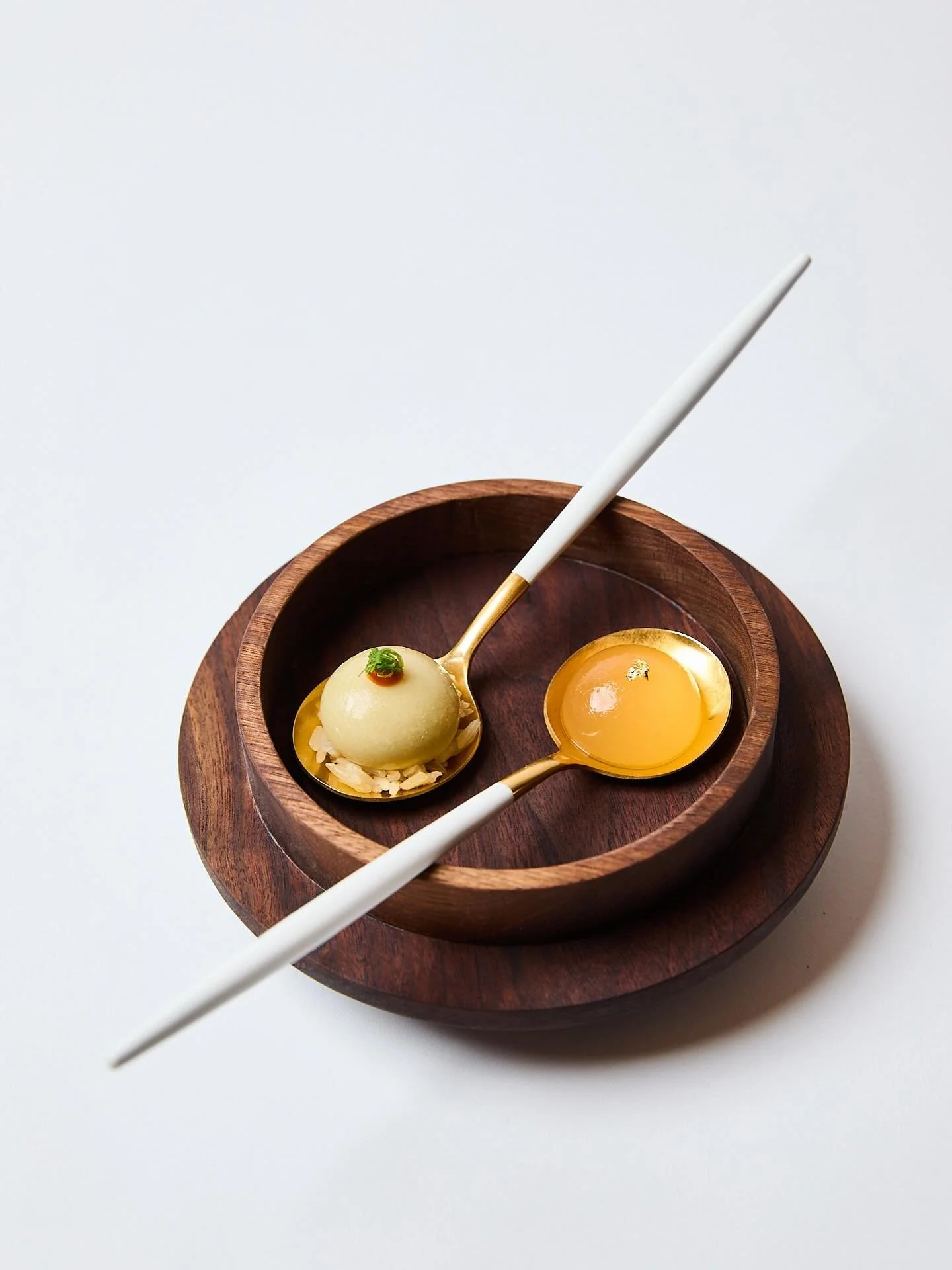 Every menu at aKin features a single bite designed to surprise and ignite the palate. This season, the sphere captures the soul of Singapore&rsquo;s Hainanese Chicken Rice in one concentrated burst. Each sphere is a fleeting explosion of flavour, gon