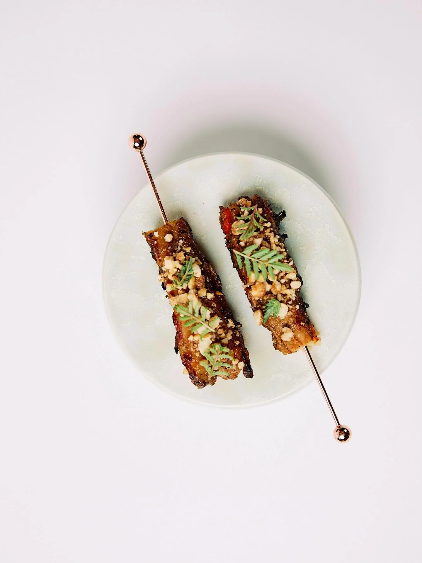 A beloved staple across Southeast Asia, celebrated for its smoky aroma and bold, charred sweetness. At aKin, it takes form in Argentinian prawns glazed and grilled to perfection, a refined nod to the vibrant energy of street food.

Less than a month 