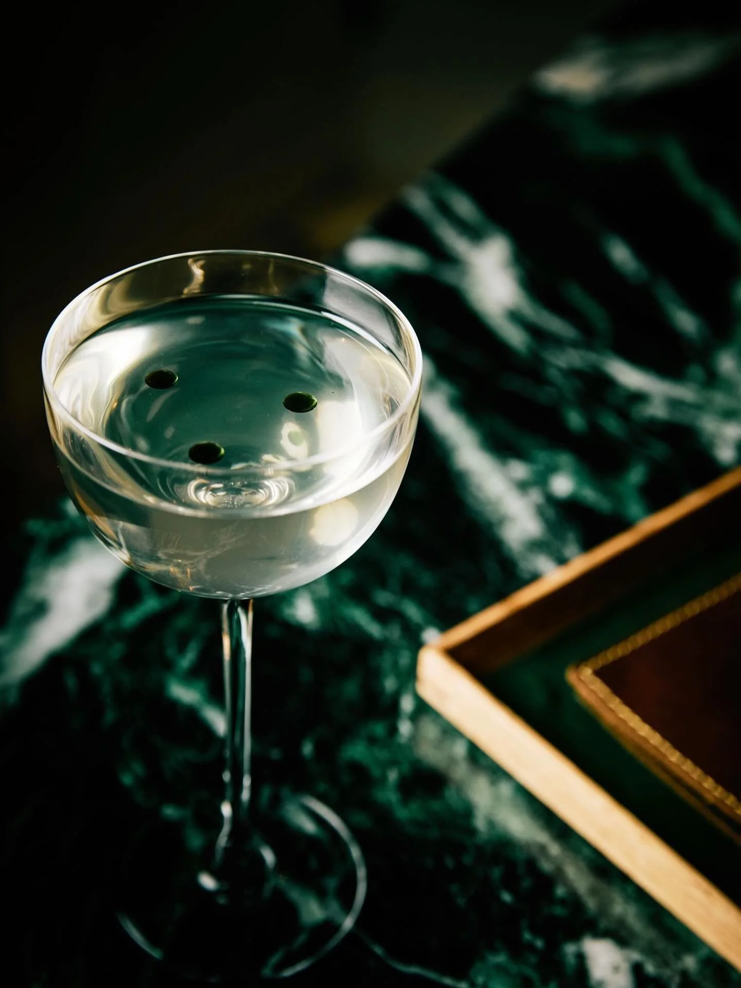 A toast to 2025. 

Silken and aromatic with a touch of umami depth, our Dragon Warrior is a study in balance. Delicate on the nose yet powerful on the palate, jasmine-infused vodka intertwines with gin, unfolding into dry vermouth and orange bitters,
