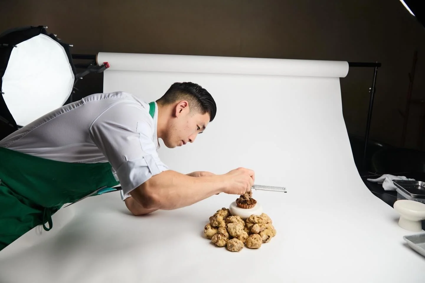 Captured during a photoshoot, maybe this with just this- 

Chef Owner Eric Chong grates fresh white truffles, and the scent alone stopped everything. Deeply earthy, intoxicating, unmistakable.

📸: @jonolawley