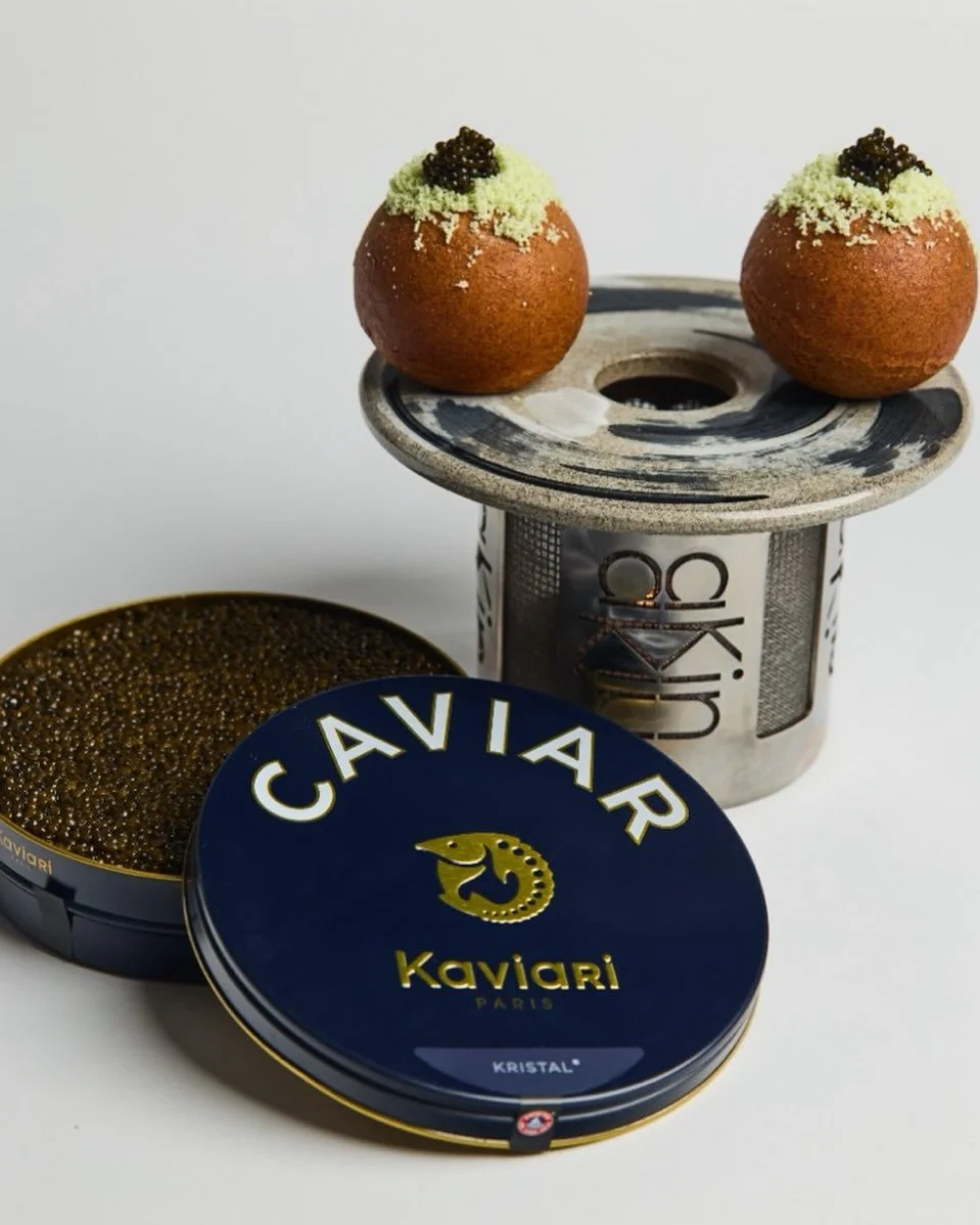 Our signature CSB has appeared in nearly every iteration of aKin. It returns because it deserves to.

A crisp beignet filled with caviar &amp; seasoned sour cream, finished generously with some more @kaviari_paris caviar.

📸: @jonolawley