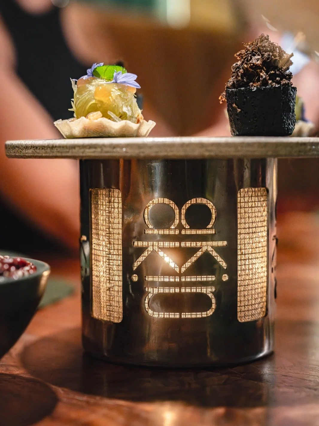 The opening snacks.

Throughout the menu, small details quietly nod to Lunar New Year traditions. These first bites are vegetarian, inspired by the Buddhist custom of eating meat free during the first days of the new year, a way of starting the year 