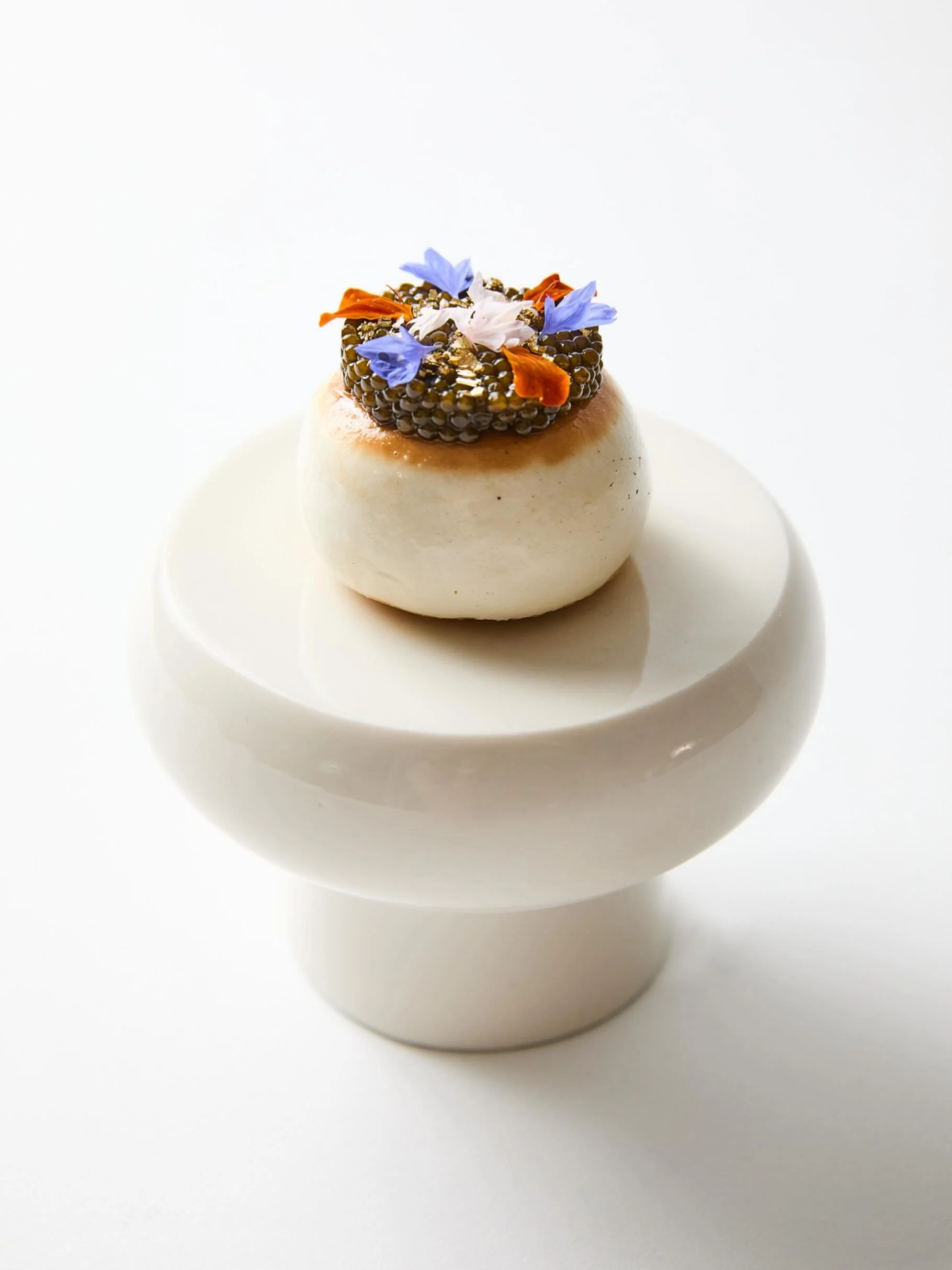 This menu&rsquo;s caviar supplement is our take on Lau Sa Bao.

A soft steamed bun filled with molten salted egg custard and topped with 10 grams of @kaviari_paris Kristal caviar. Sweet, savoury, rich and incredibly delicious.