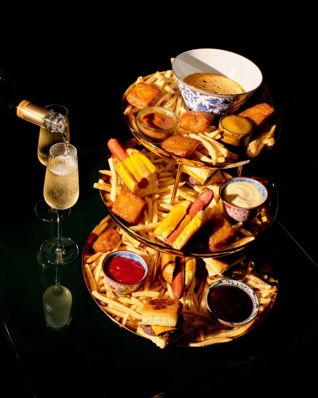 The Tower. ⁠
⁠
Hot Dogs, Chicken Nuggets, Sliders, Fries. Don&rsquo;t forget the champagne. A grand dish for two&mdash;beginning tonight.⁠
⁠
Our Fall menu has arrived.