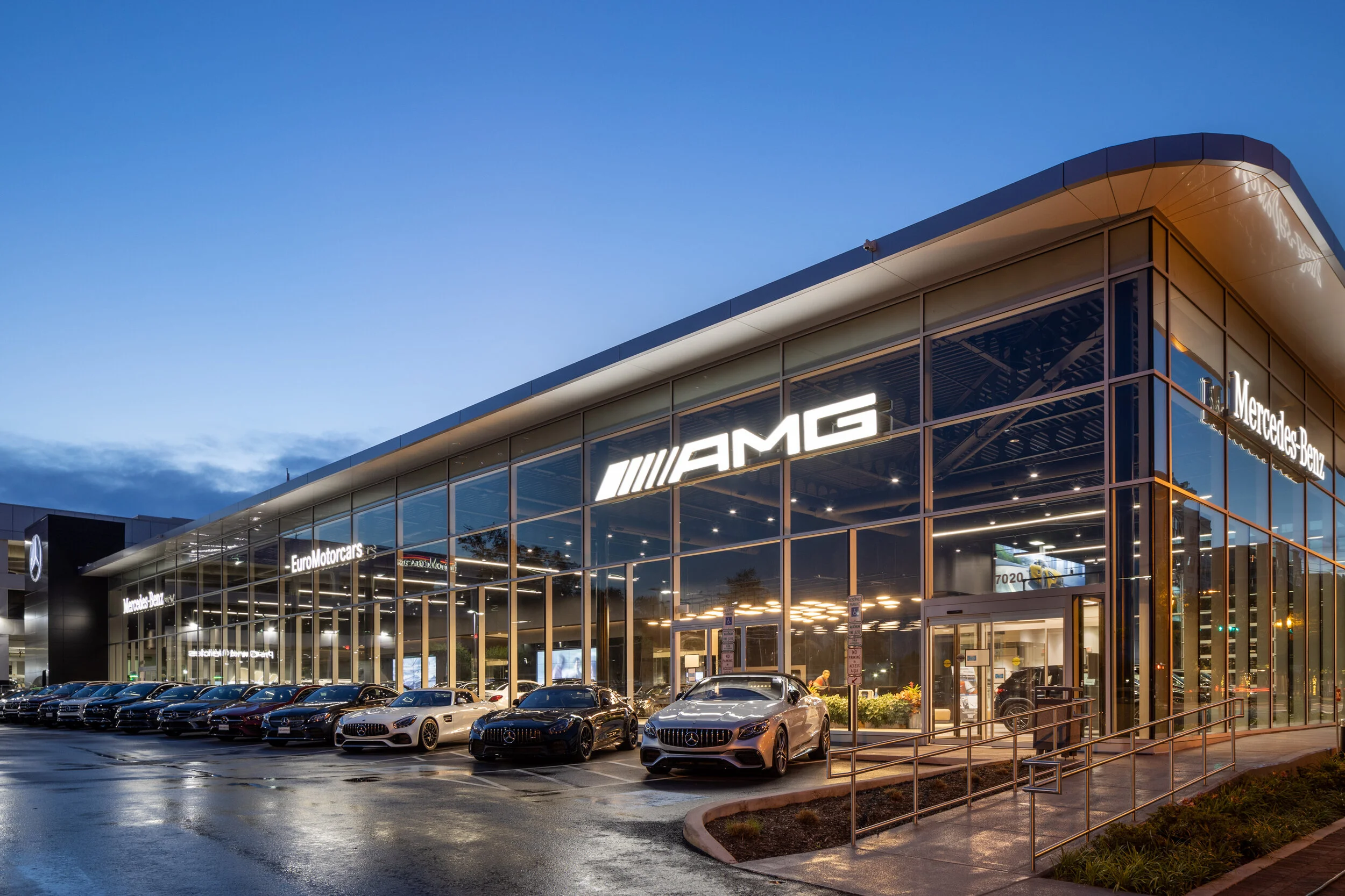 Wetting the pavement at the Mercedes dealership in Bethesda, MD, adds extra pizzazz at twilight.