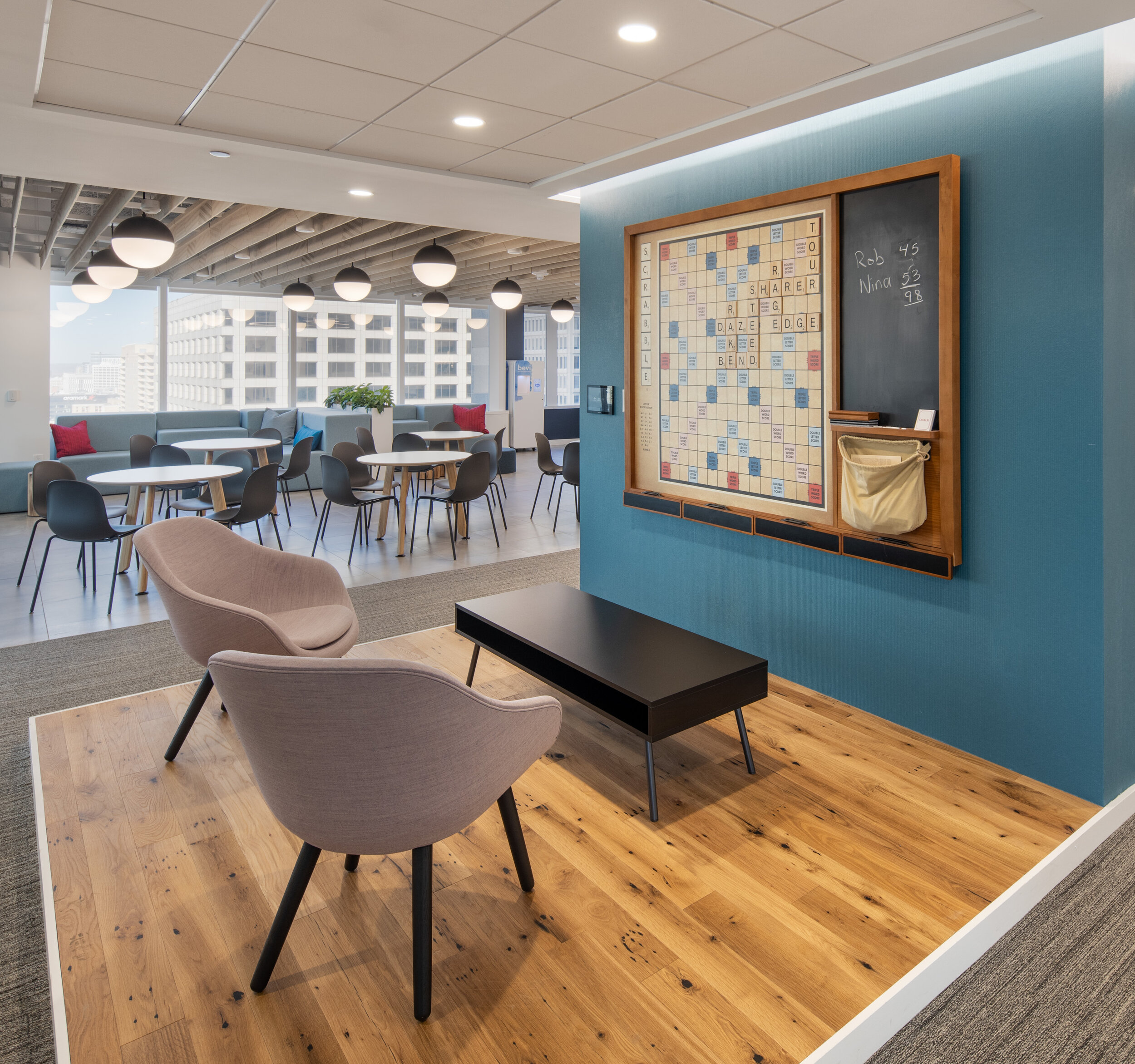 Challenge a co-worker to a game of giant Scrabble.