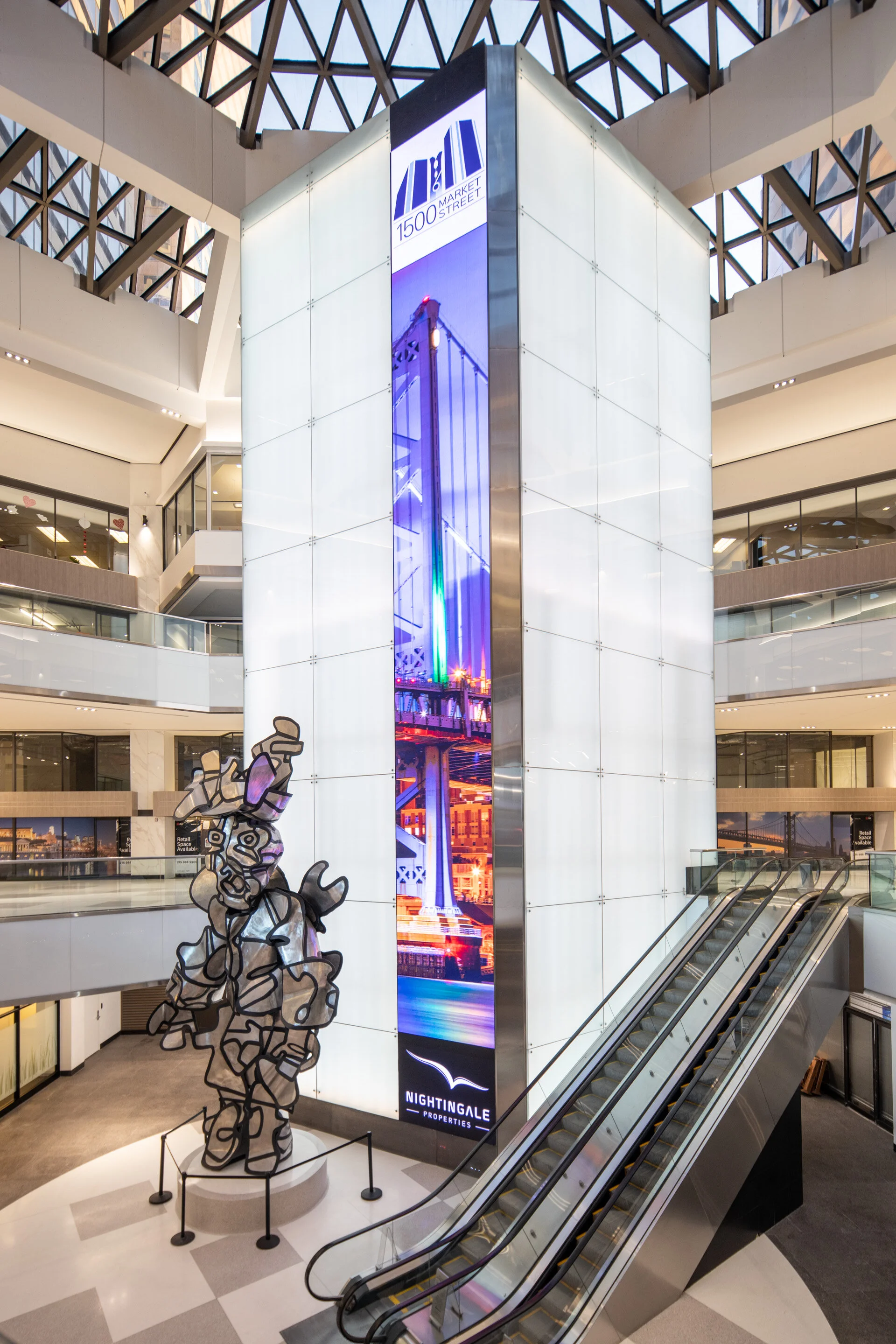 The large central atrium has been enlivened with light panels, a video wall focal point, new flooring, and lighting.