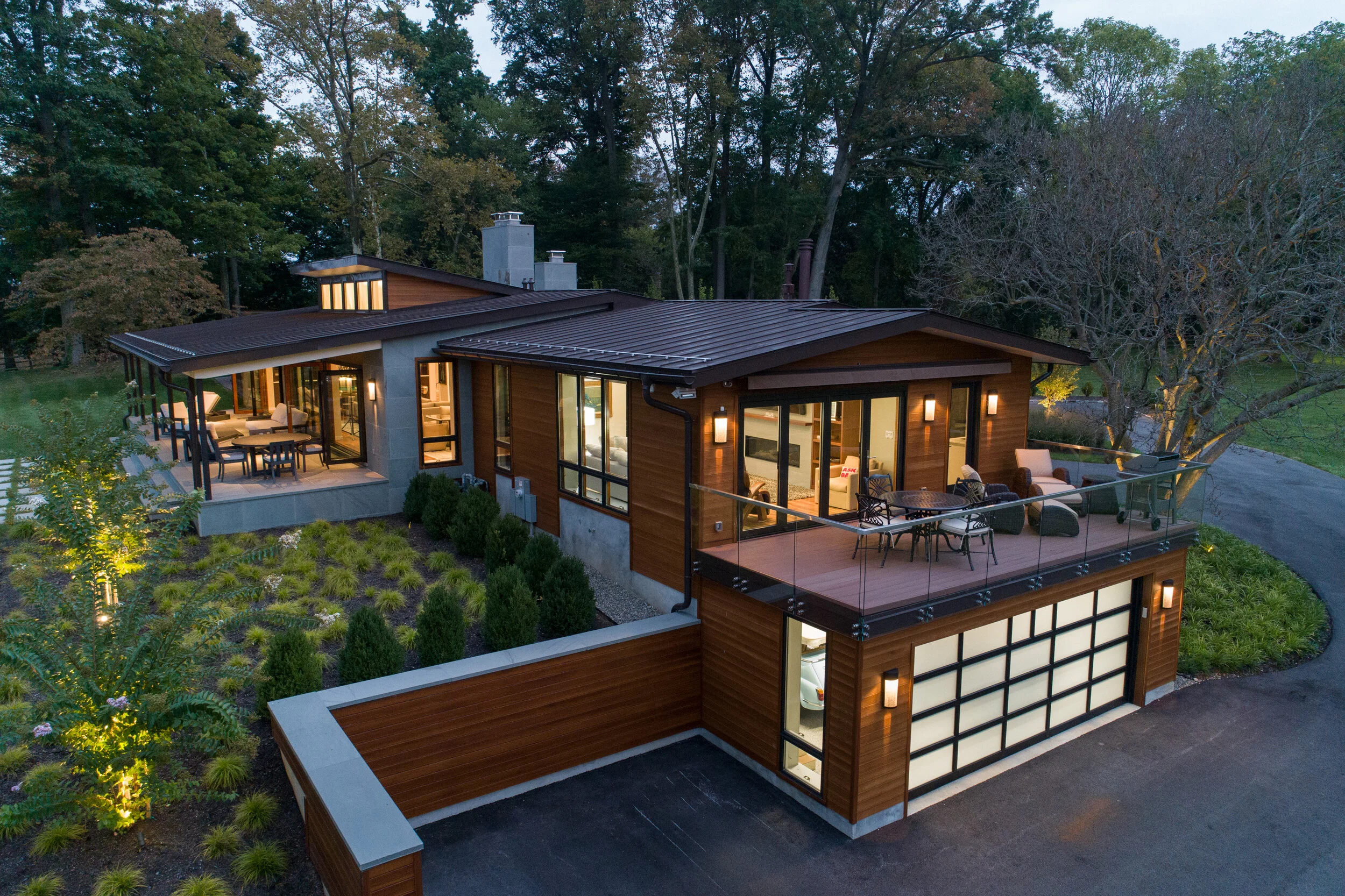 Twilight invites a peek into a revitalized suburban residence.