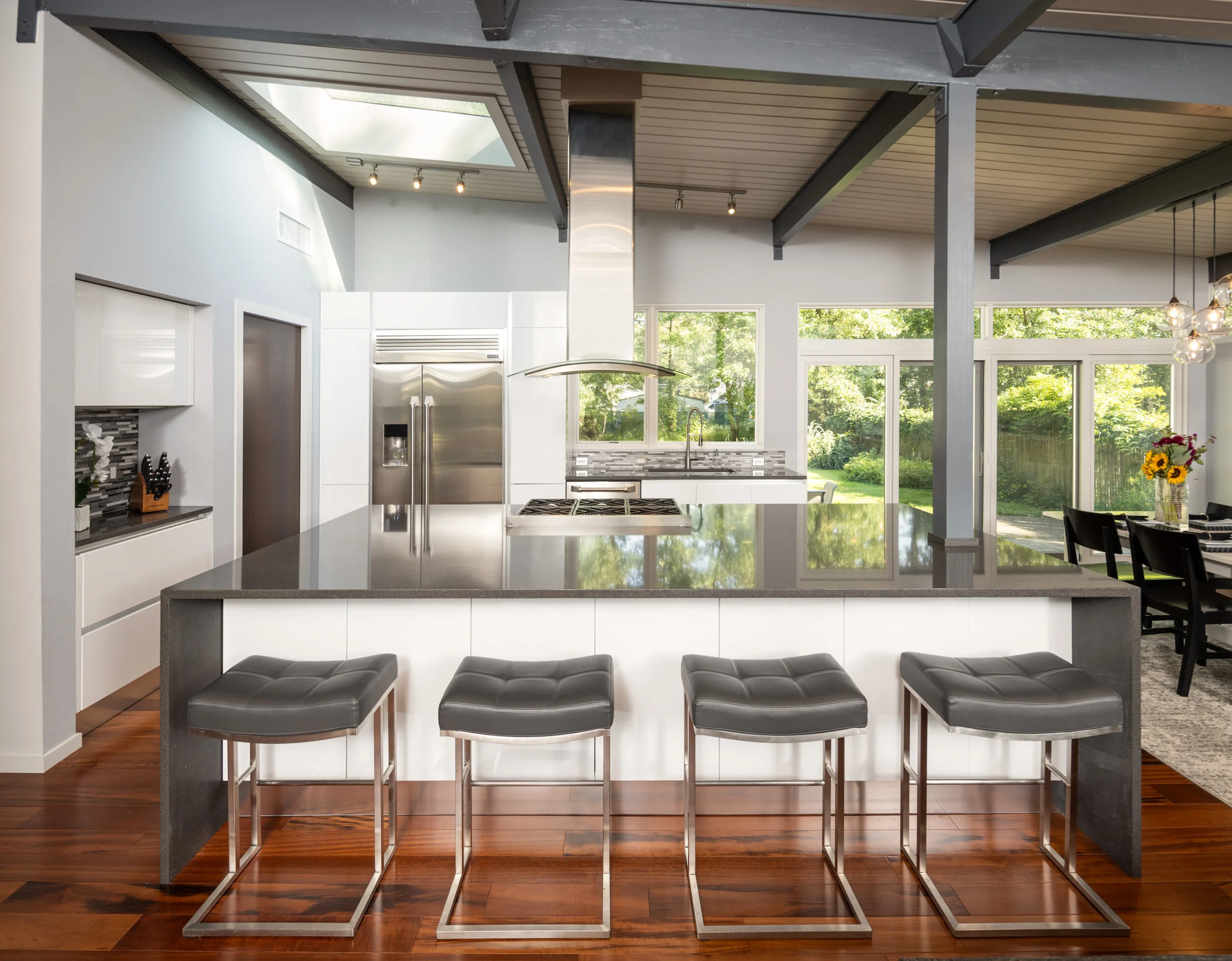 Views out to a lush green yard make interiors more inviting.