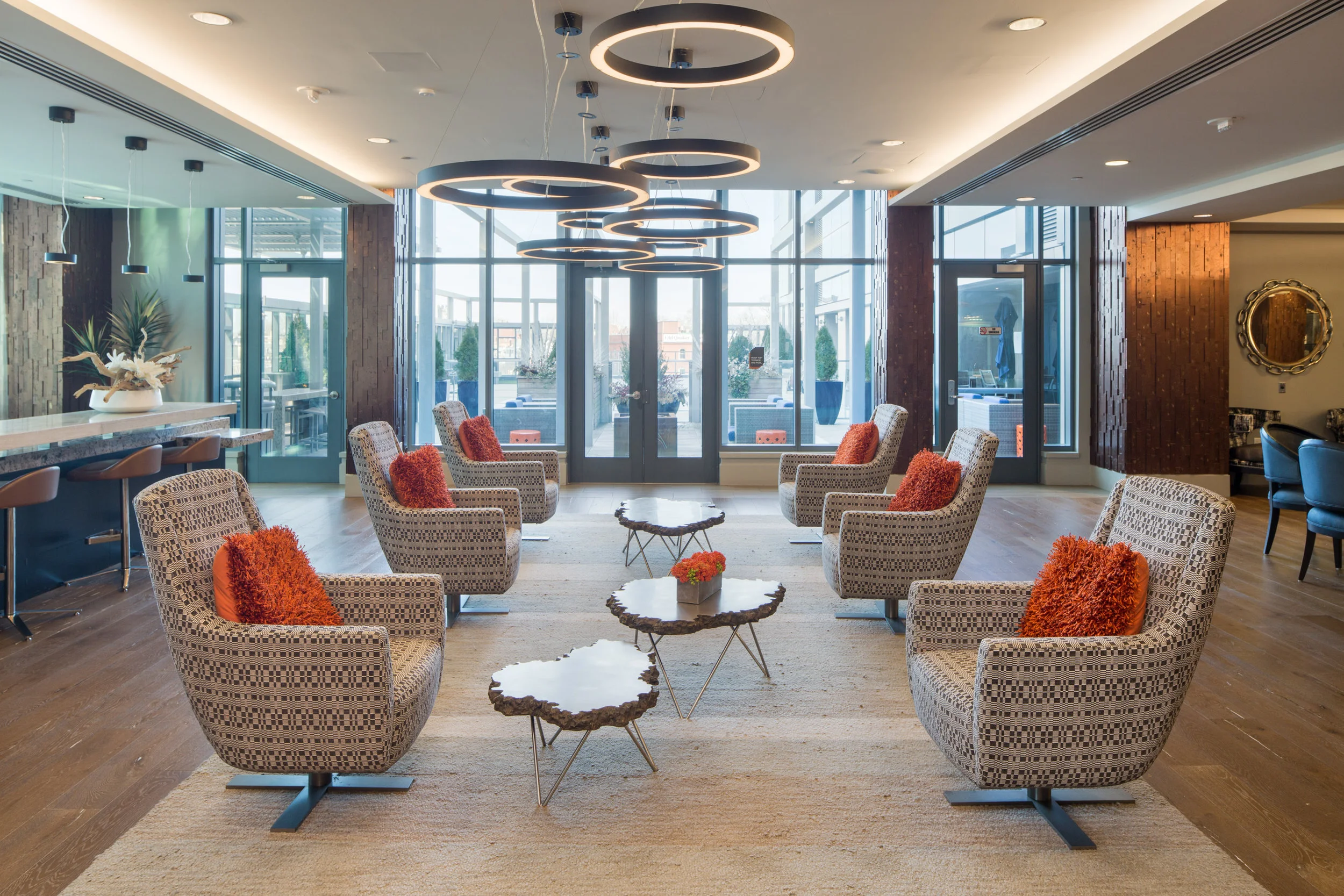 This ergonomic, yet cozy lounge opens onto an expansive roof deck.