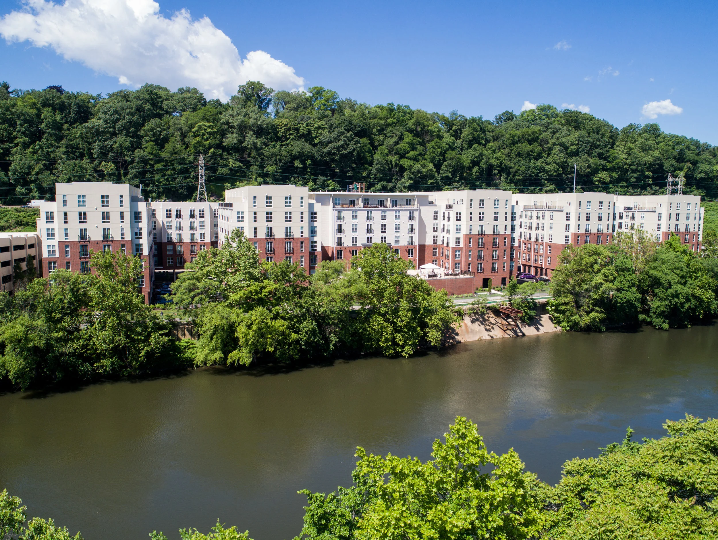 Going wide. The Royal Athena apartment building next to the Schuylkill River, as seen from a drone operated next to the building.
