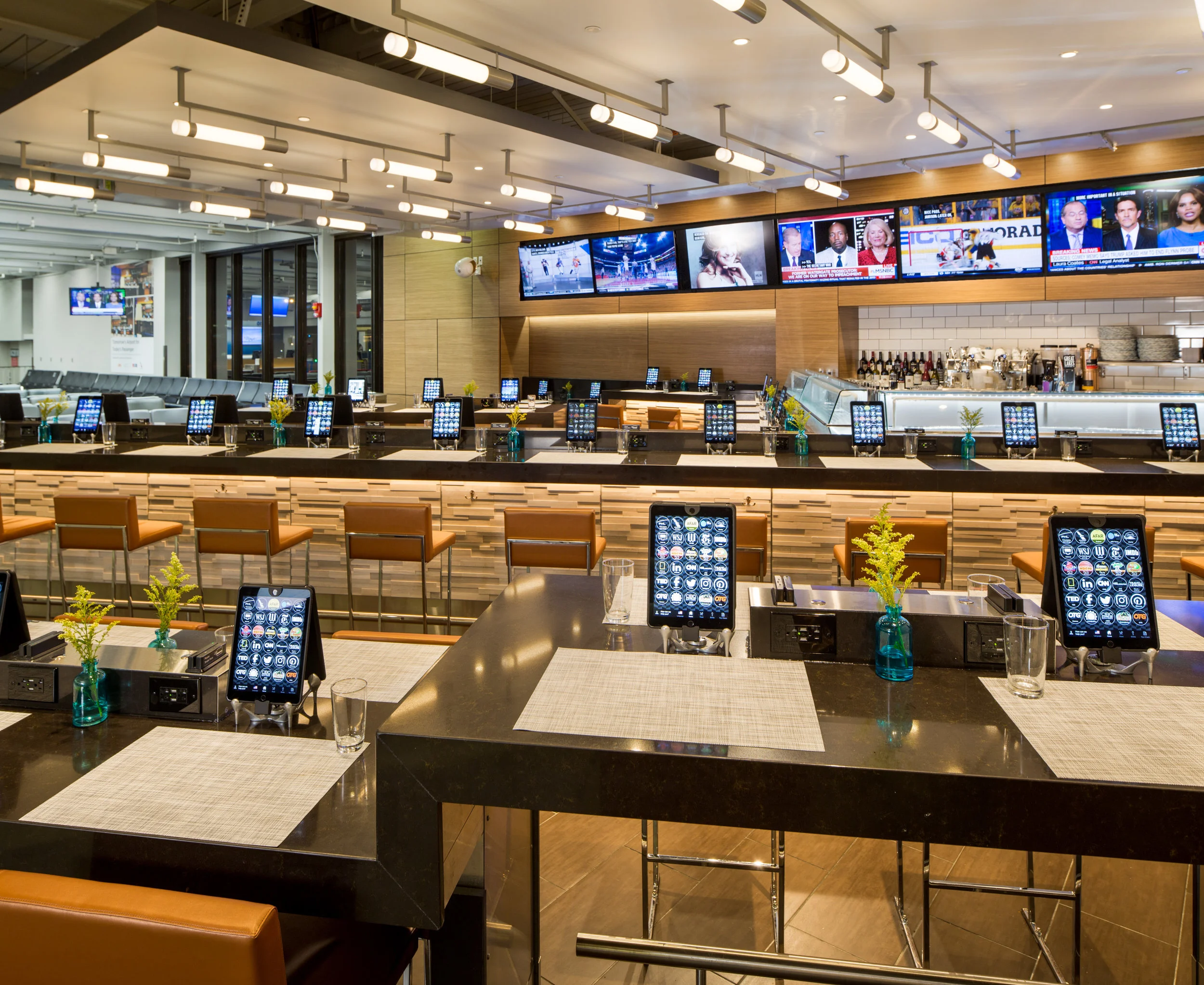 Each seat has an iPad for ordering, paying and tracking when your flight is scheduled to depart.