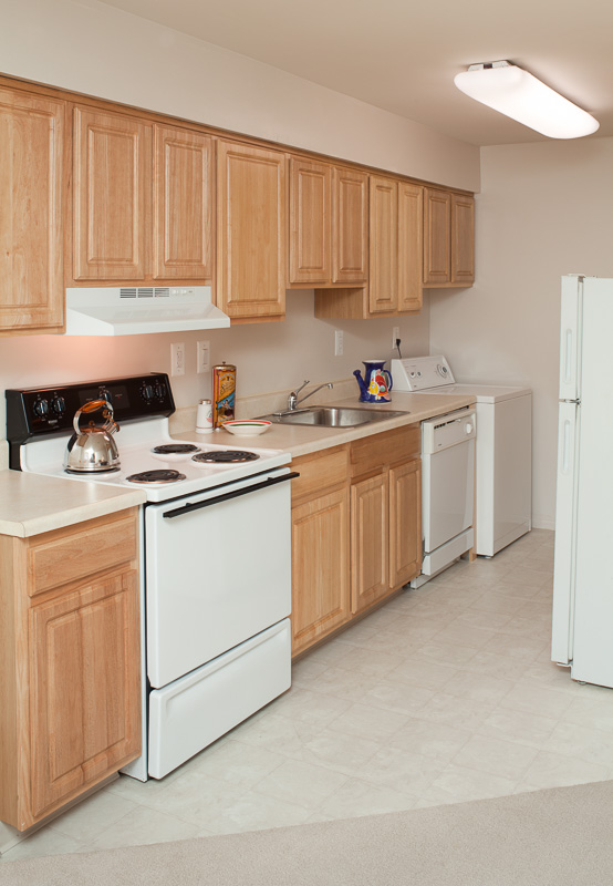 BEFORE: Outdated “builder-grade” finishes had no personality or warmth.