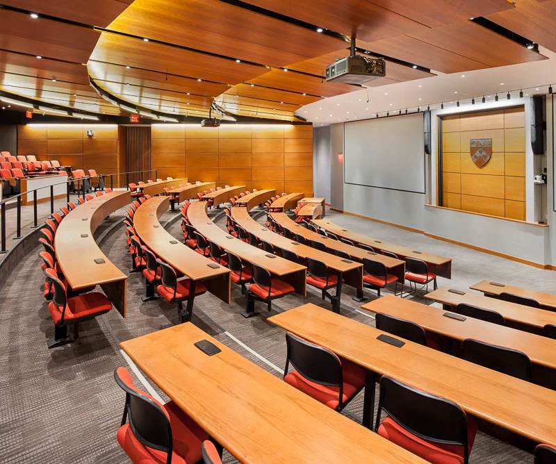 The spacious Fitts Auditorium features warm wood tones and a variety of lighting levels to respond to student’s and faculty’s needs.