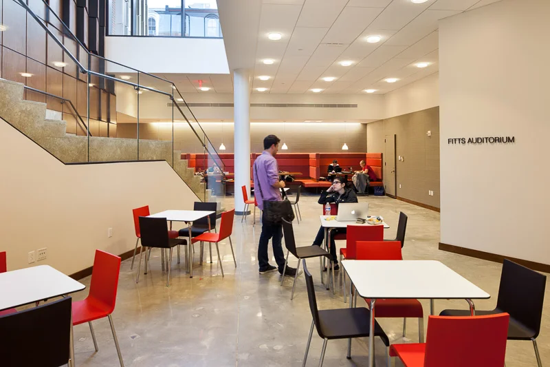 Located on the lower level of Golkin Hall, just outside the main auditorium, this open lounge area provides space for students to socialize between classes.