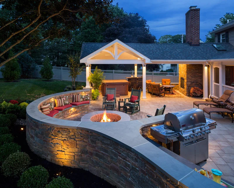Get ready to toast s’mores (or a glass of wine!) by the firepit in this elegant outdoor entertaining area.