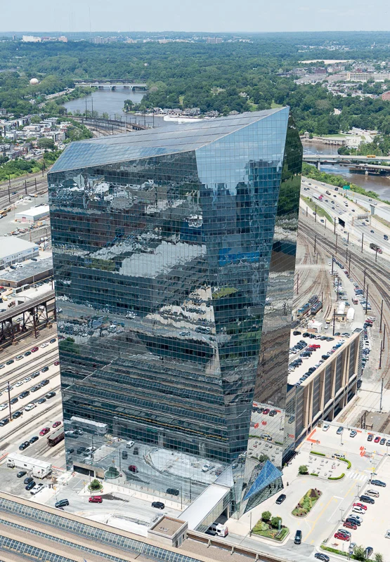 Shot from high up, the Cira Center in Philadelphia reflects its surroundings.