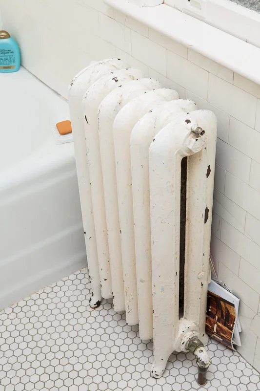 Original cast iron radiator.