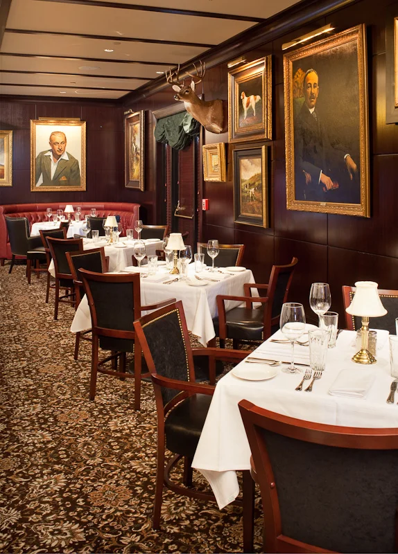 Dark paneled rooms give Capital Grille an old school cozy feeling.