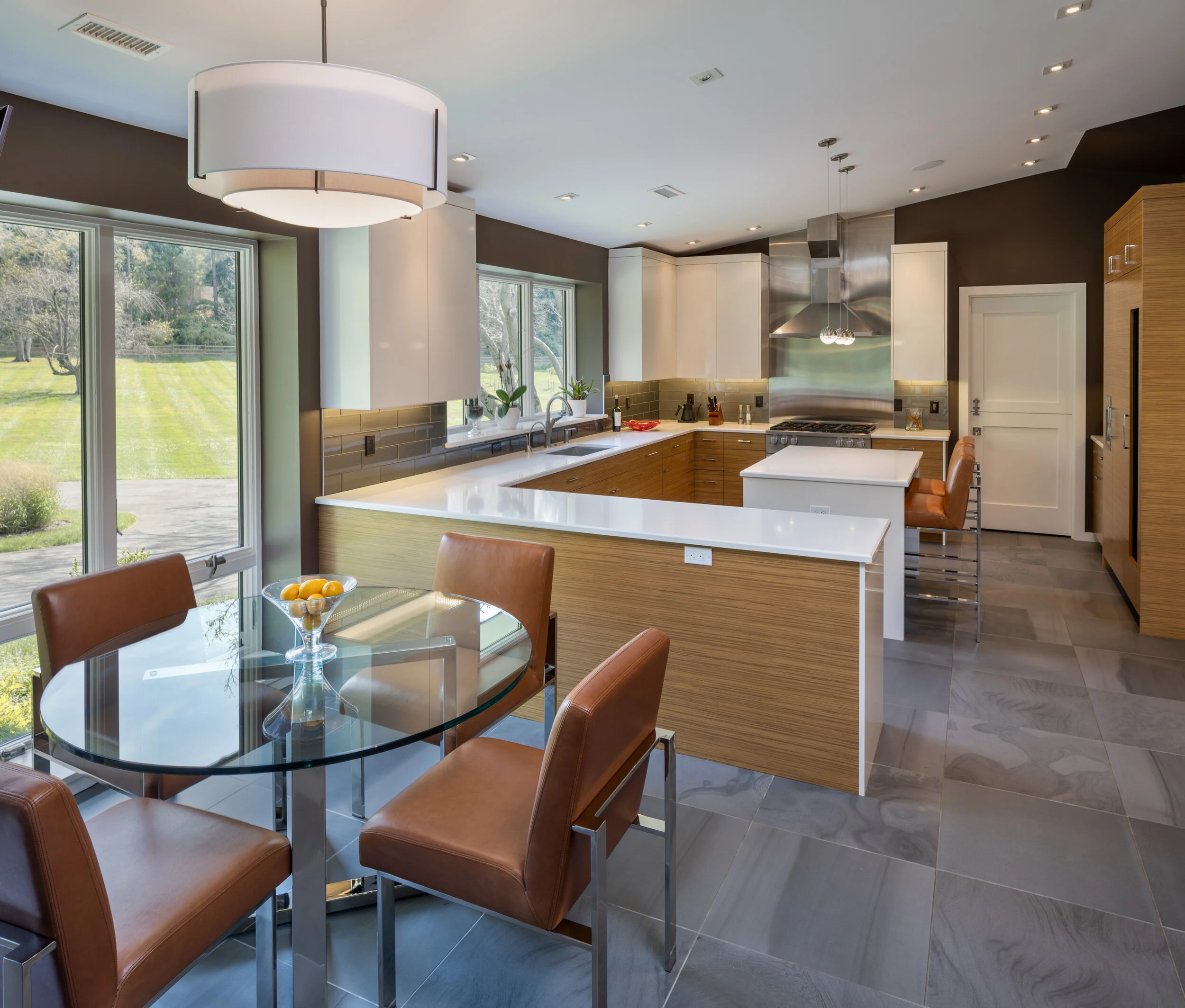 A kitchen design and textures that convey modern, stylish and classic.