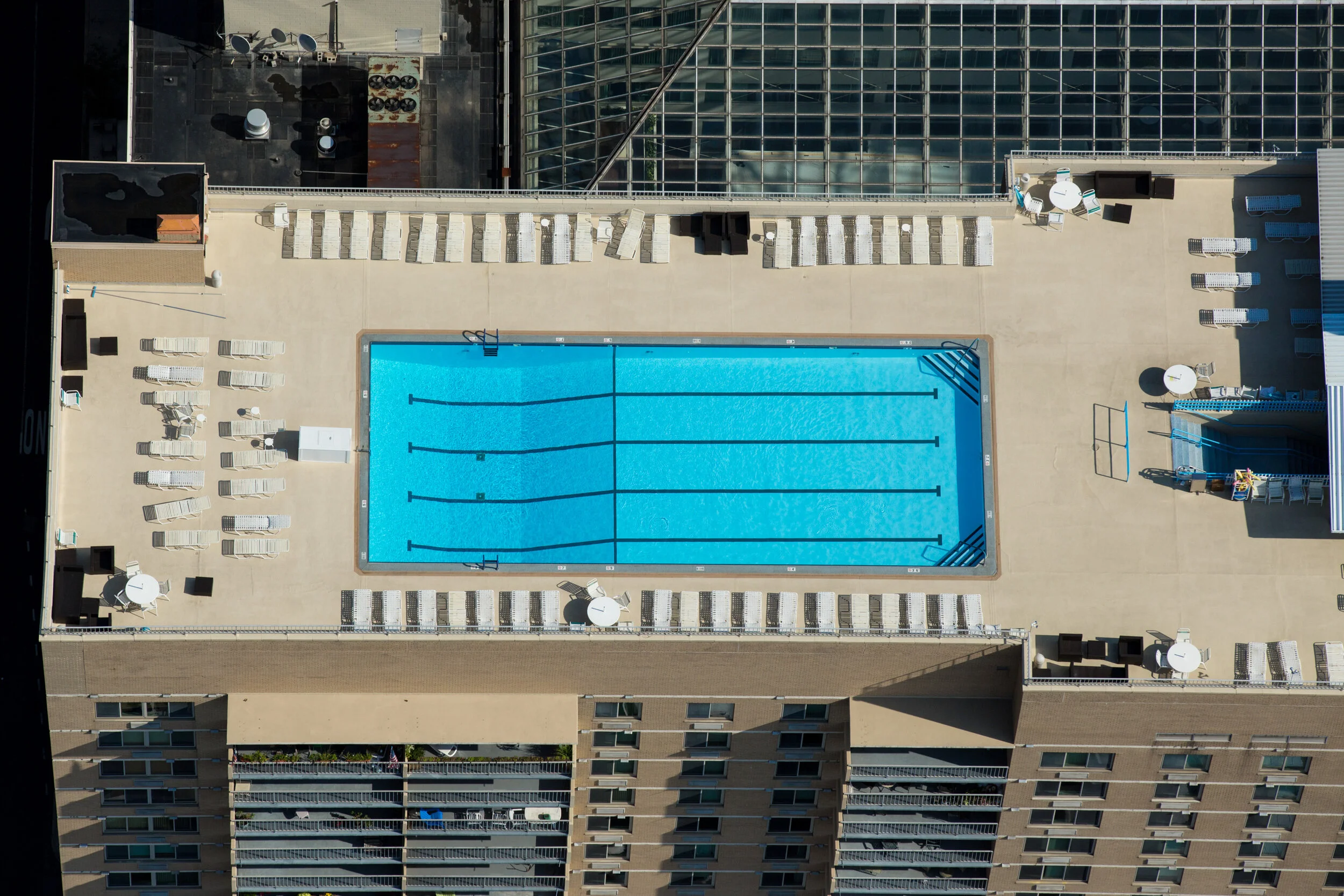 Rooftop pool on a Philadelphia high rise, as seen from a helicopter. Drones also come in handy on these sorts of shots.