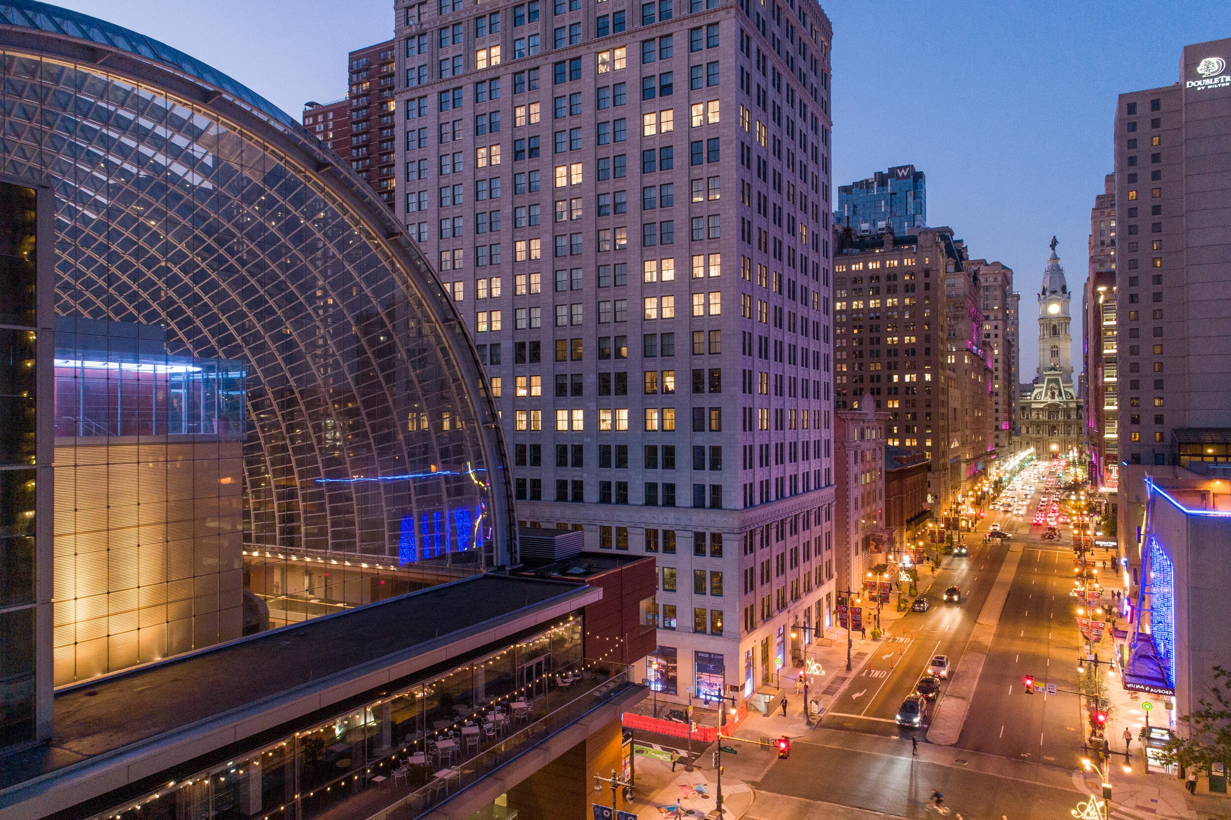 Avenue of the Arts with Kimmel Center on the left and City Hall at the end.