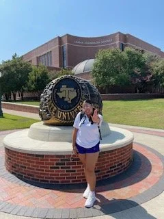 Katie, MHS AVID Scholar, poses in Stephenville at Tarleton State on the way to class her first year on campus!