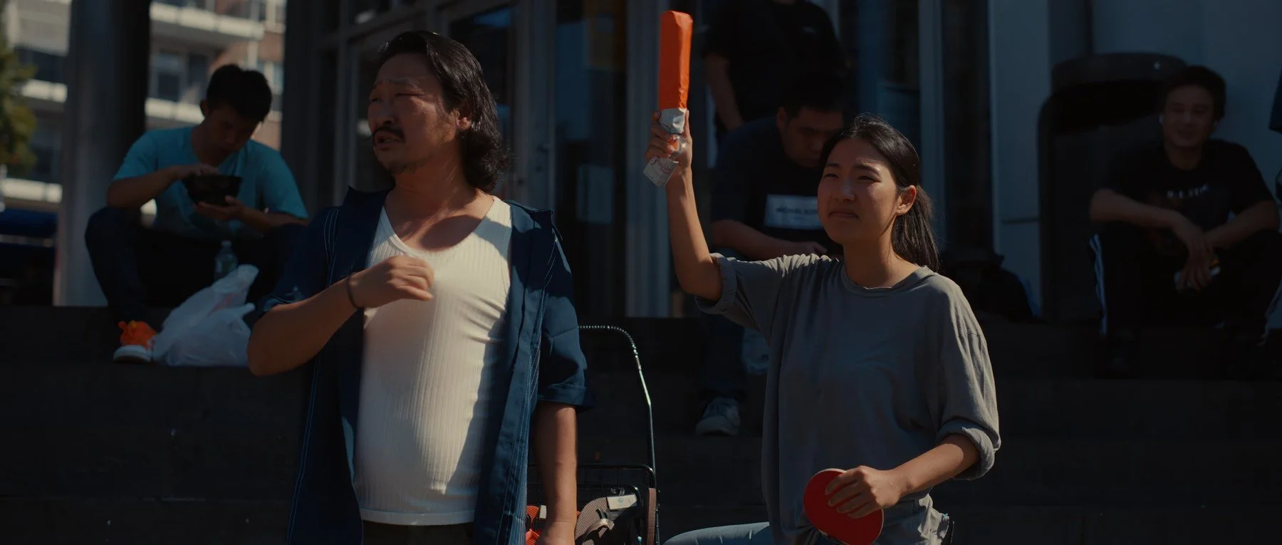 Pedigree short film still — Kai Wen Hu - Samuel and Squid sell wares as street vendors in Flushing, New York City on a hot summer day.