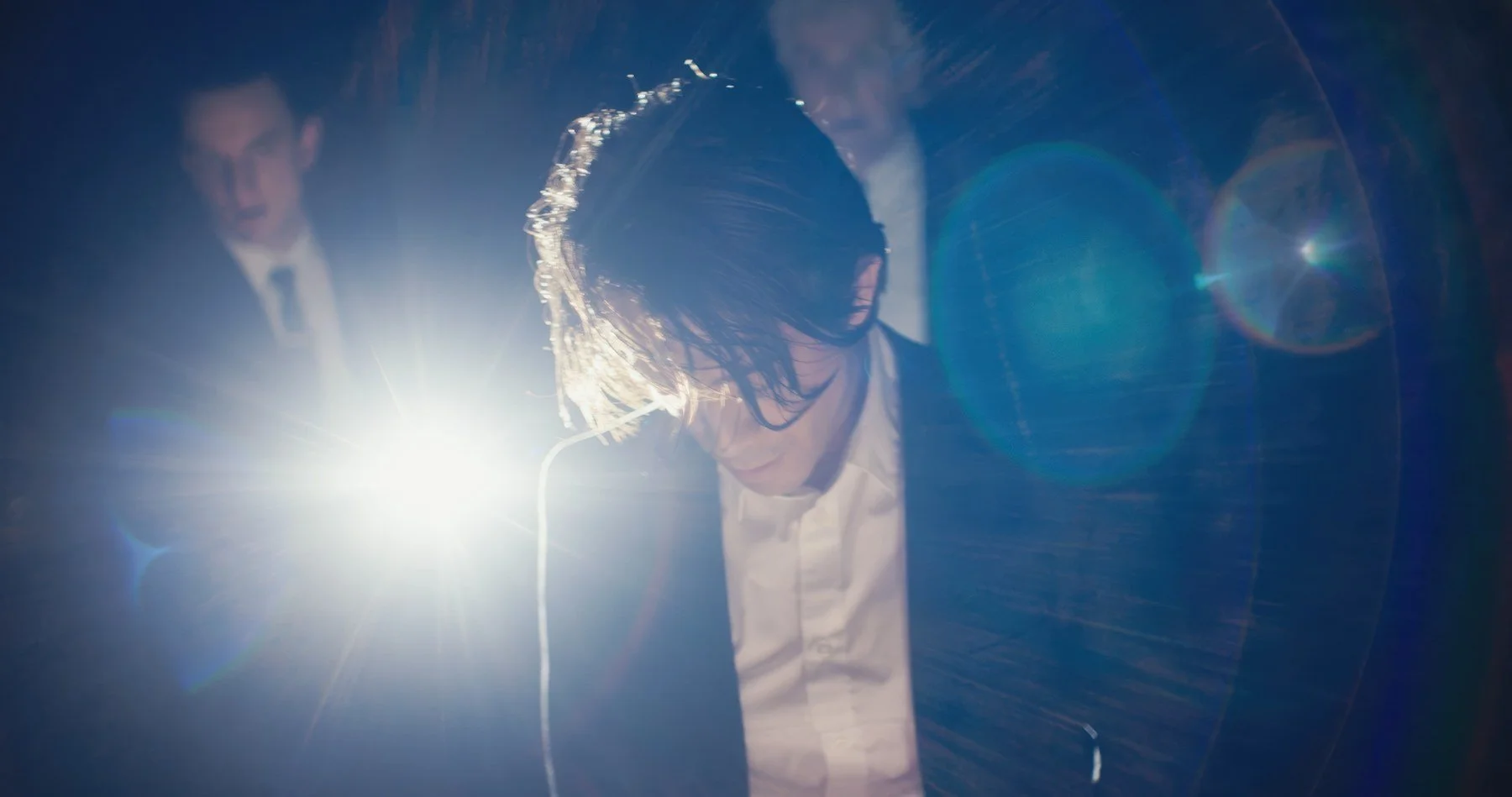 Bloodworm short film still — Kai Wen Hu - The Drifter and his pursuers, now captors.
