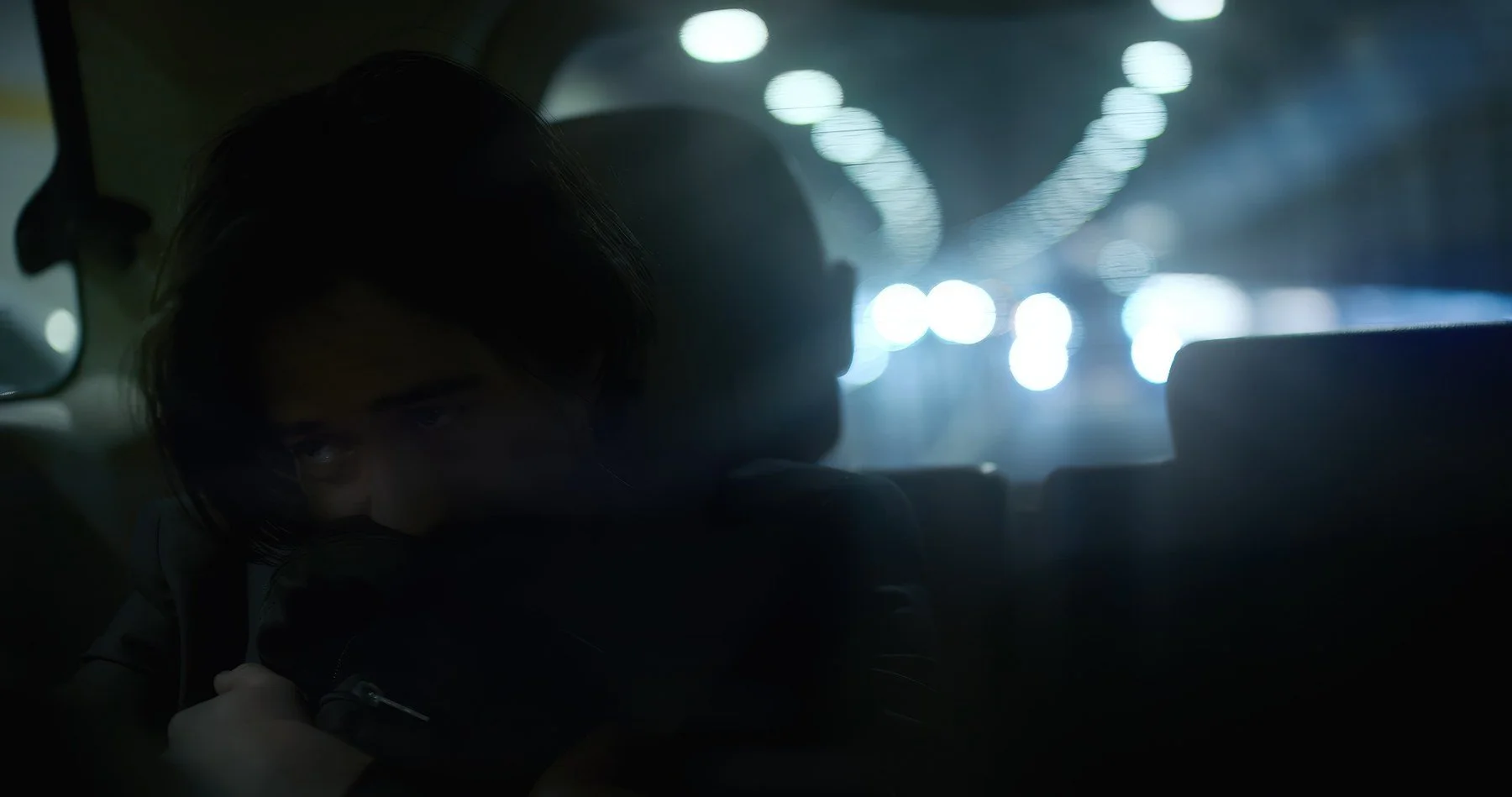 Bloodworm short film still — Kai Wen Hu - The Drifter pays for a ride into town with his newfound belongings.