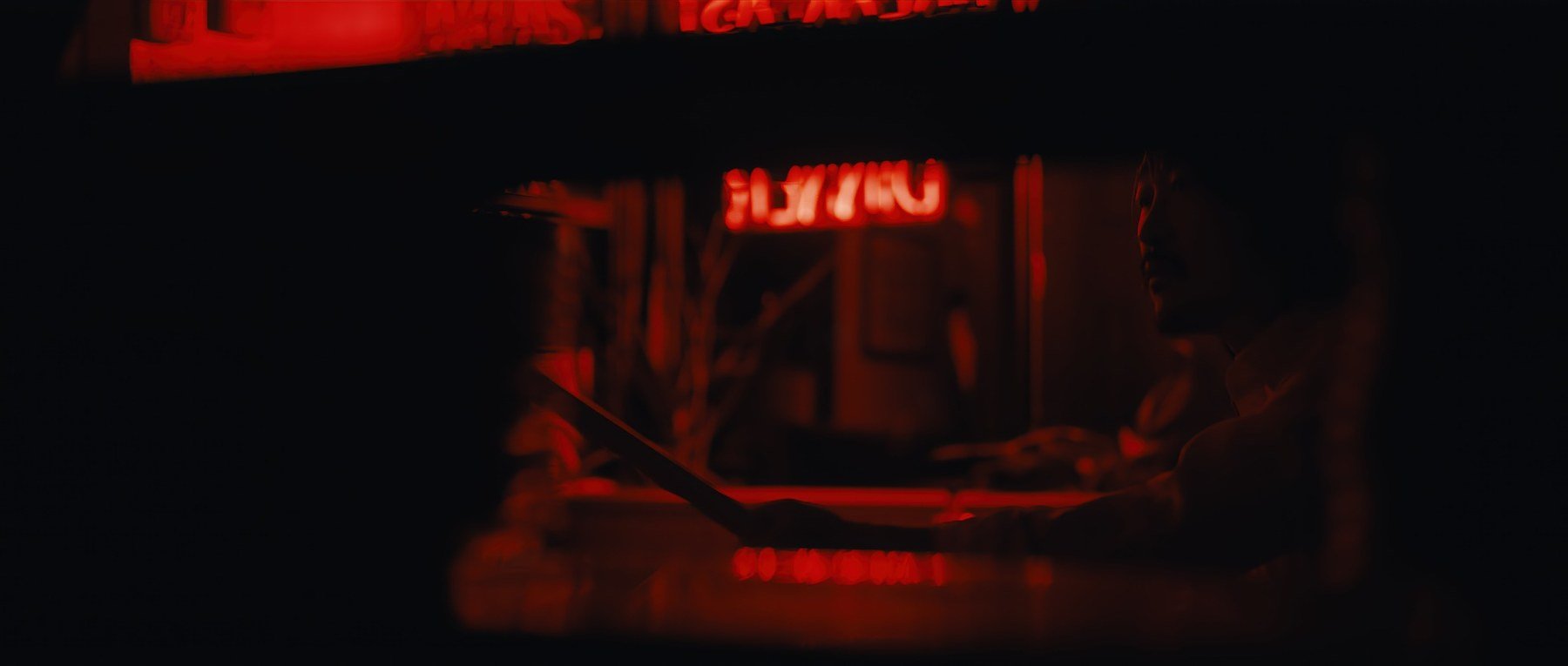 Pedigree short film still — Kai Wen Hu - Samuel confronts a strange sound in the diner.