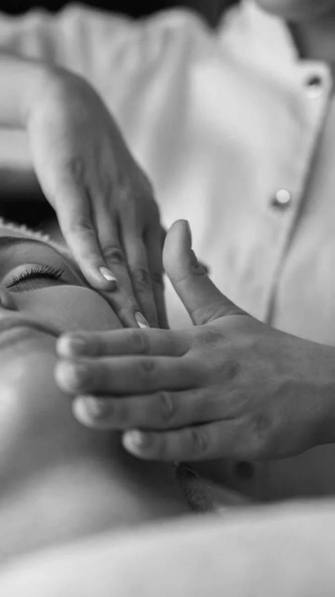 Person receiving a facial massage