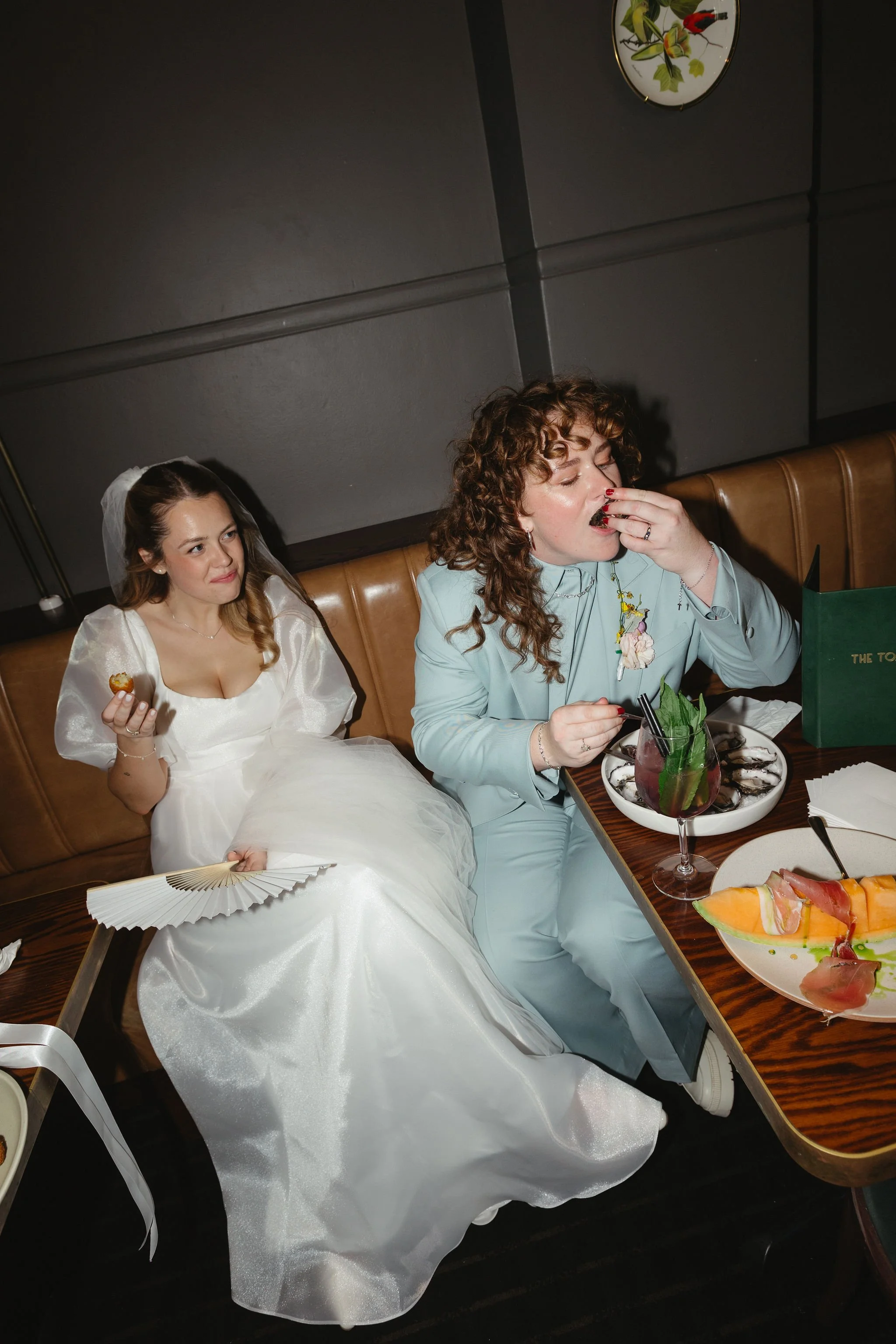 Wedding couple eat snacks 