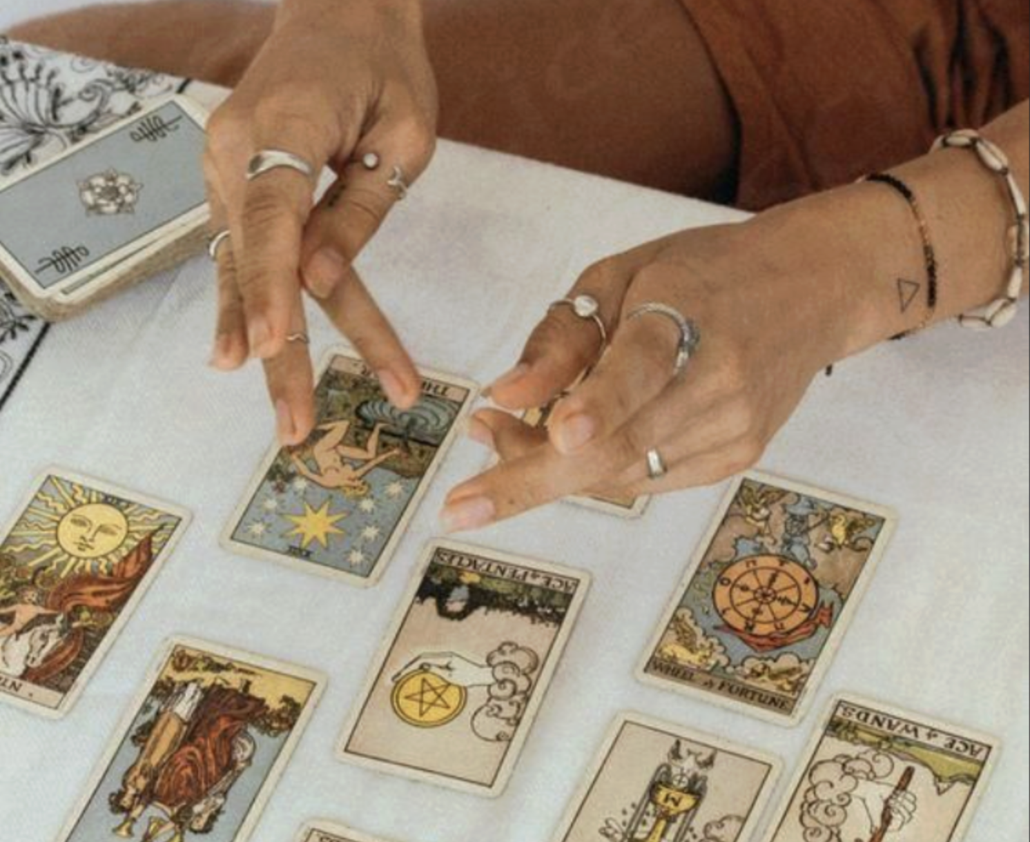 Tarot cards spread across a table during an intuitive reading session