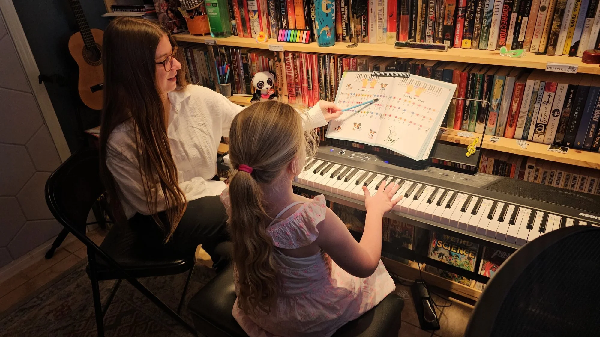 Alona Liesniak teaching a young piano student at Cave Creek Music Academy in Tatum Ranch