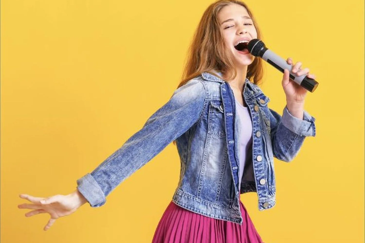 Teen voice student singing during a lesson at Cave Creek Music Academy