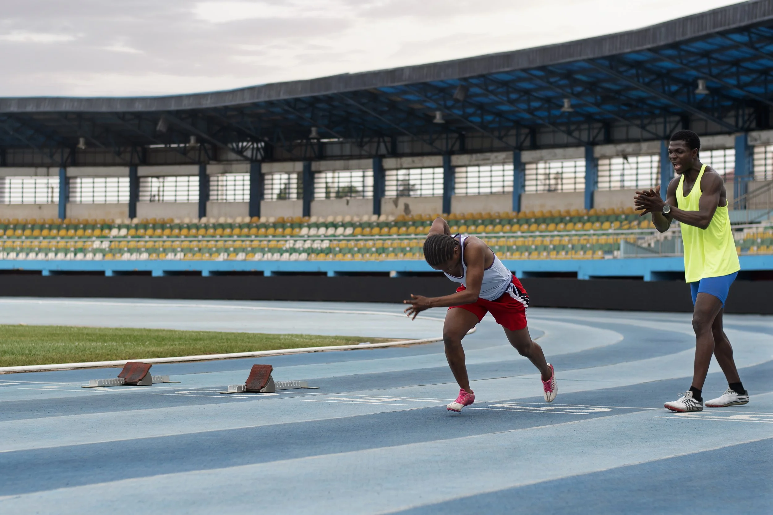 athletes-starting-line-stadium.jpg