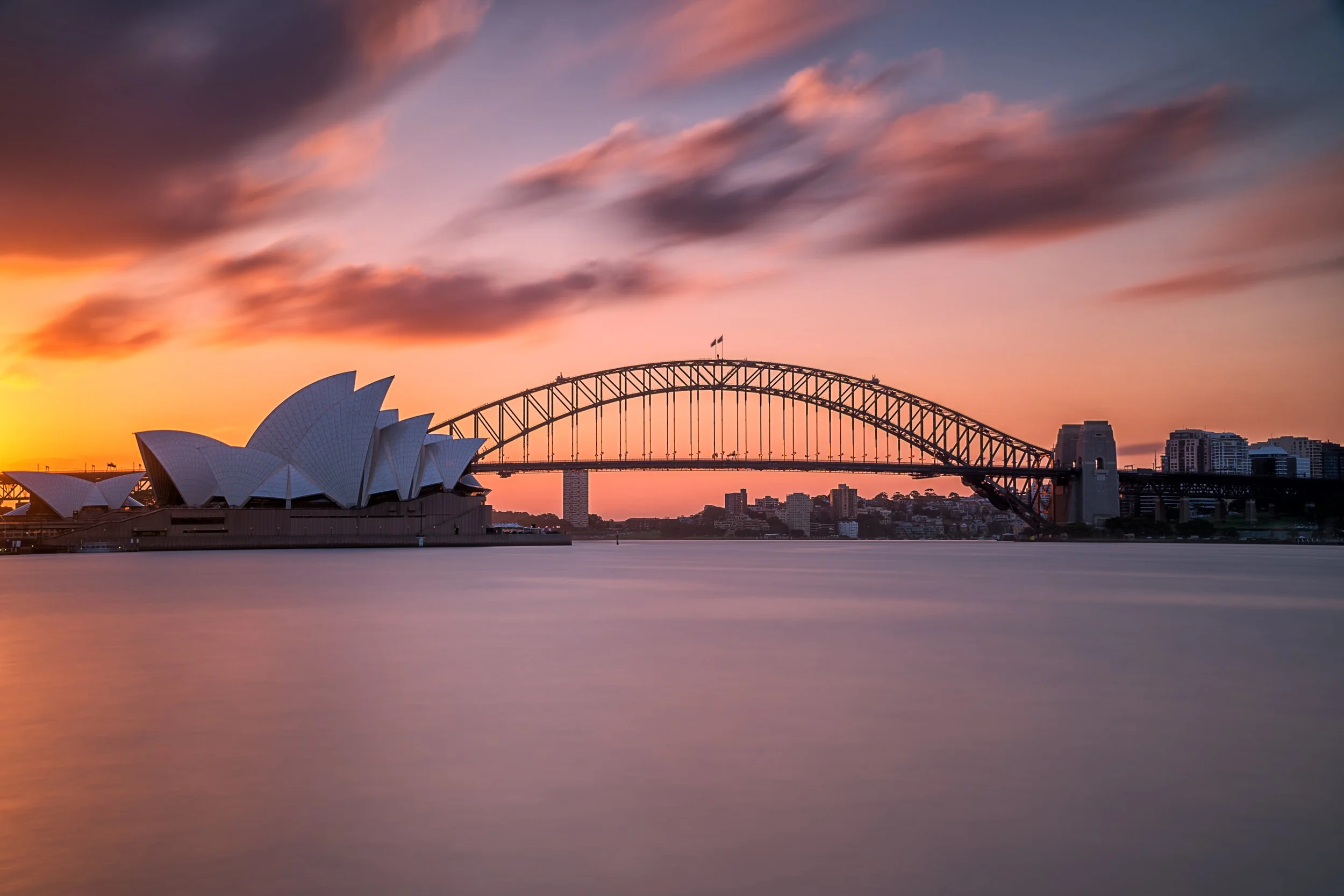 beautiful-shot-sydney-harbor-bridge-with-light-pink-blue-sky.jpg