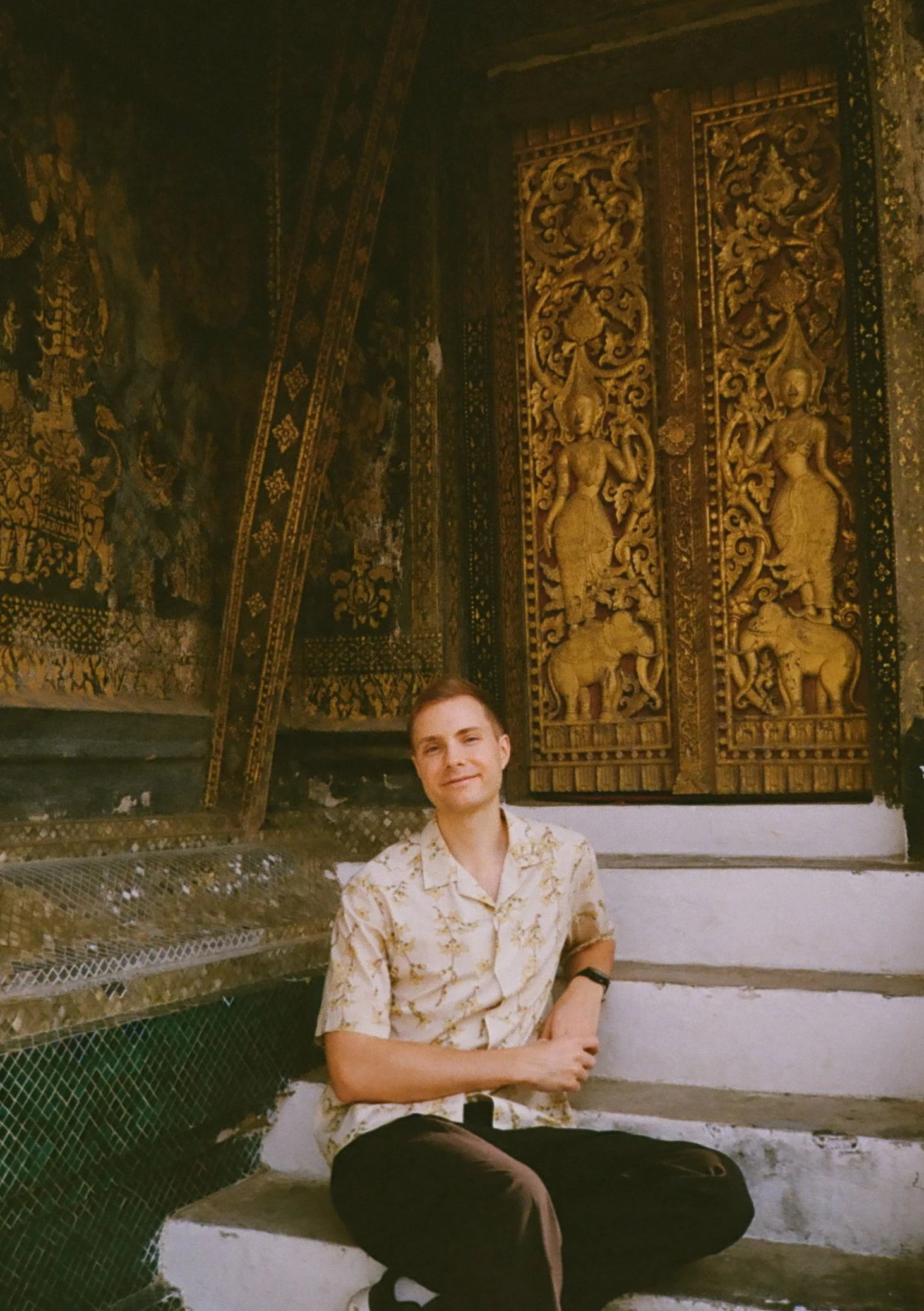 Intricate gold stencilling at Wat Xieng Thong Temple
