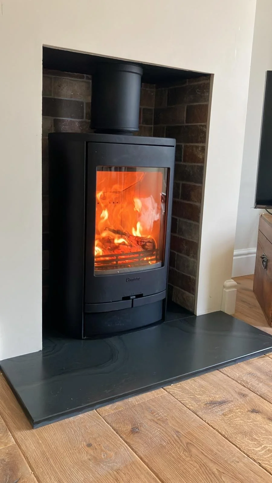 Modernised fireplace with Contura Woodburner