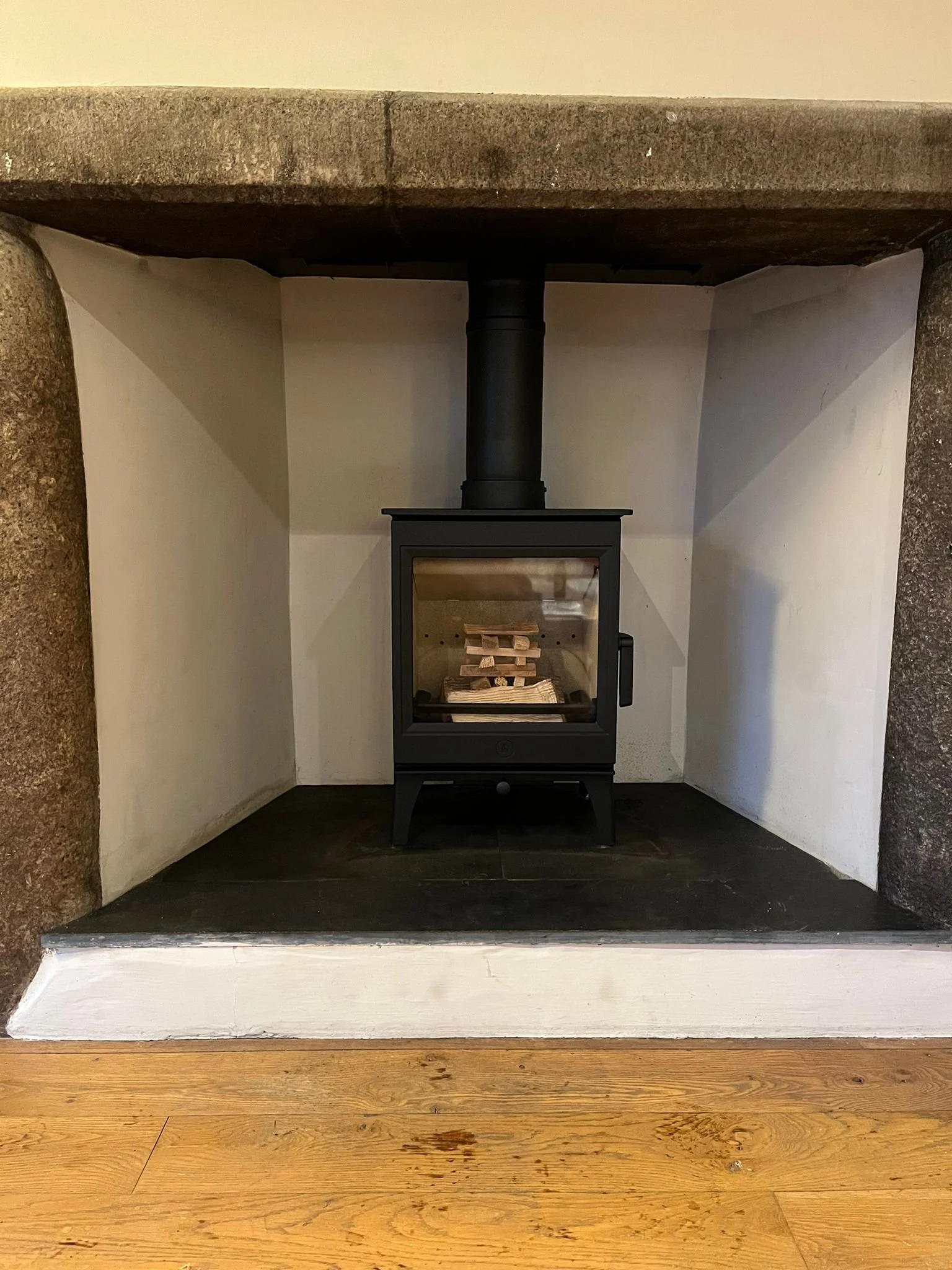Charnwood in a very traditional Cornish Fireplace